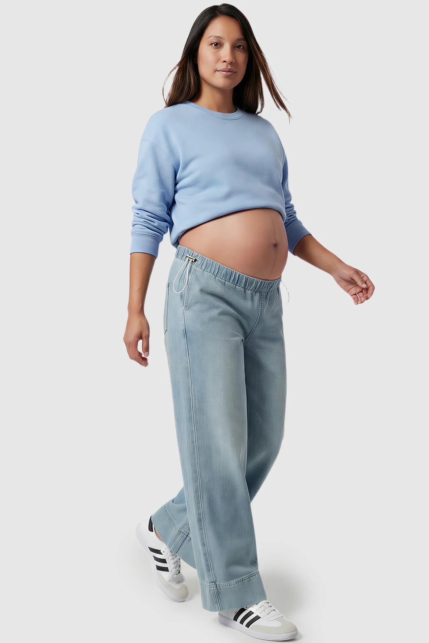 Drawstring Wide-Leg Maternity Jeans Drawstring Wide-Leg Maternity Jeans in light blue featuring adjustable waist and relaxed full-length silhouette on pregnant model showing front.