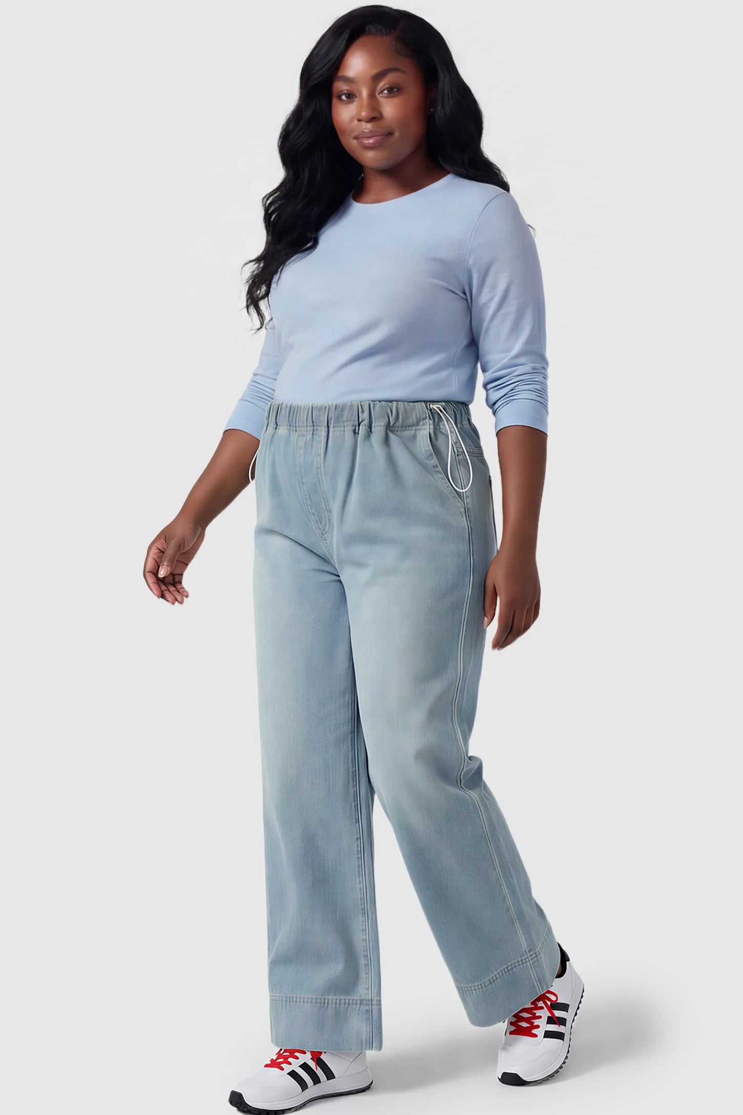 Drawstring Wide-Leg Maternity Jeans Drawstring Wide-Leg Maternity Jeans in light blue featuring adjustable waist and relaxed full-length silhouette on plus size pregnant model front view.
