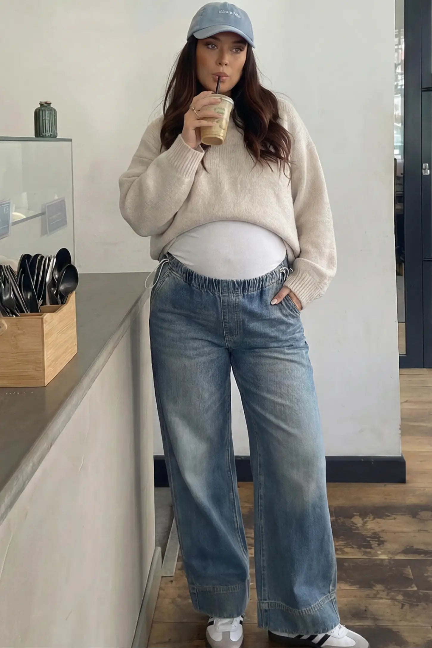 Drawstring Wide-Leg Maternity Jeans Drawstring Wide-Leg Maternity Jeans in vintage blue featuring adjustable waist and relaxed full-length silhouette on pregnant model front view.