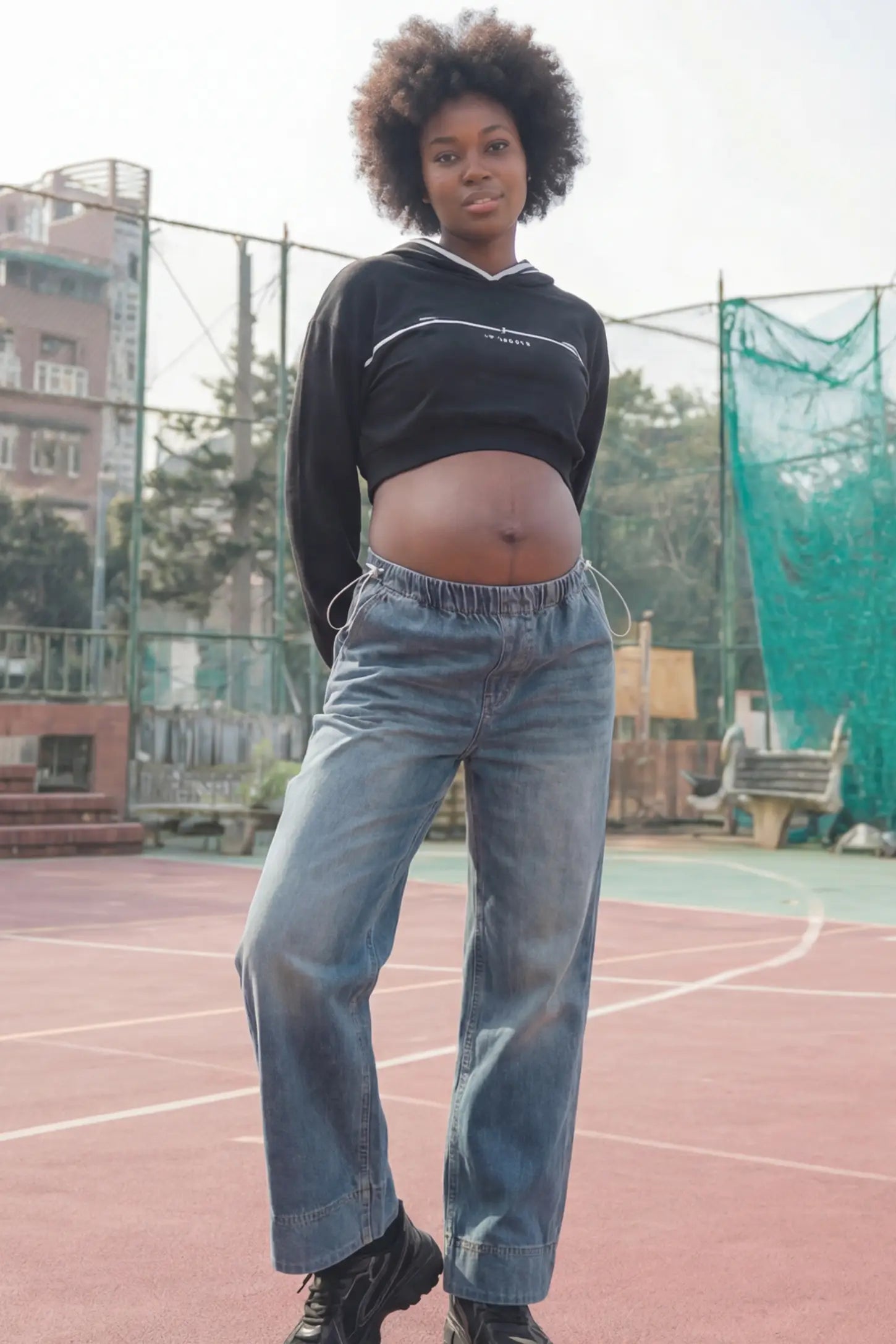 Drawstring Wide-Leg Maternity Jeans Drawstring Wide-Leg Maternity Jeans in vintage blue featuring adjustable waist and relaxed full-length silhouette on pregnant model front view.