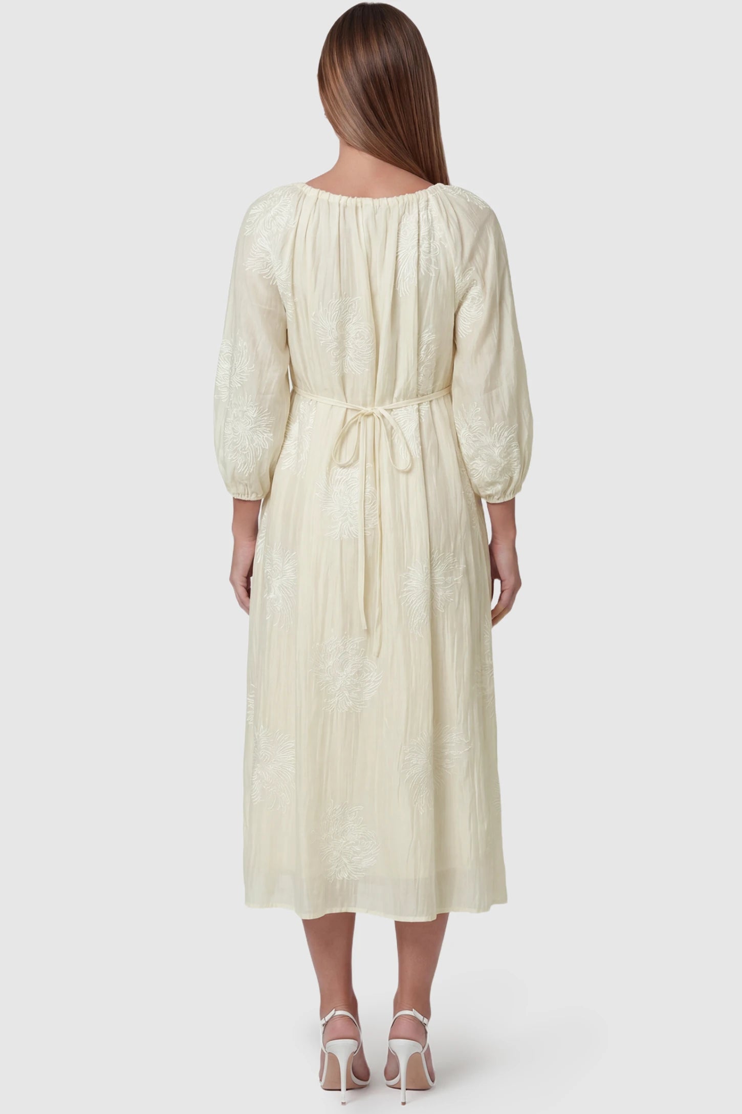 Embroidered Floral Gathered Tie Front Maternity Midi Dress Embroidered floral gathered tie front maternity midi dress in pale yellow with delicate floral embroidery, back view on pregnant model