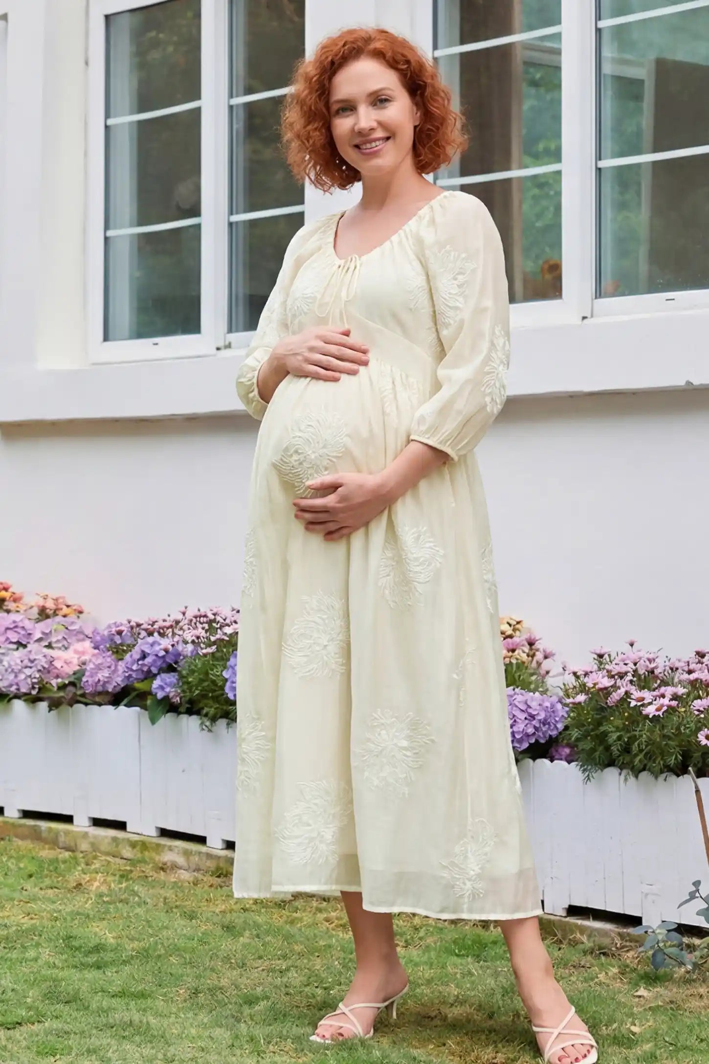 Embroidered Floral Gathered Tie Front Maternity Midi Dress Embroidered floral gathered tie front maternity midi dress in pale yellow with delicate floral embroidery, front view on pregnant model