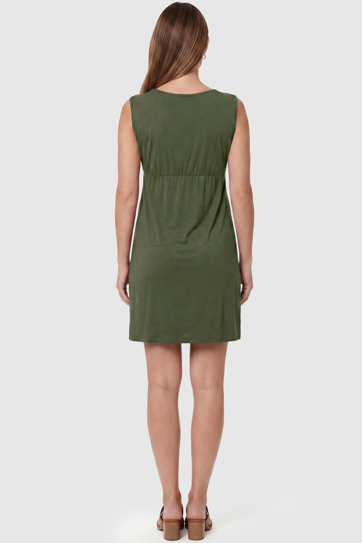 Sleeveless Empire Waist Maternity Short Dress Sleeveless empire waist maternity short dress in army green with short length and sleeveless design, back view on pregnant model