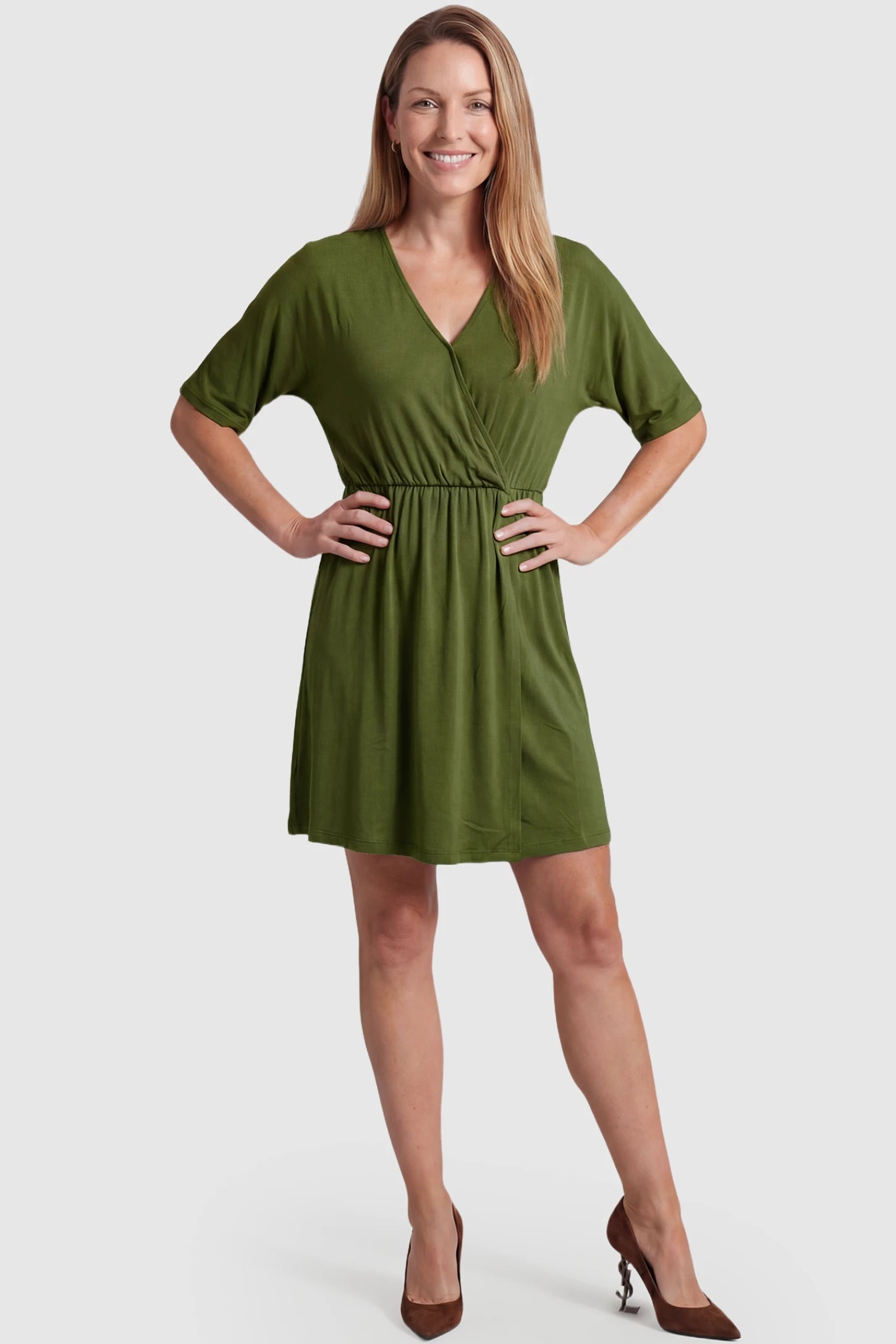 Wrap Front Empire Waist Maternity & Nursing Mini Dress Wrap Front Empire Waist Maternity & Nursing Dress in army green featuring a draped crossover V-neck and short sleeves on non pregnant model.