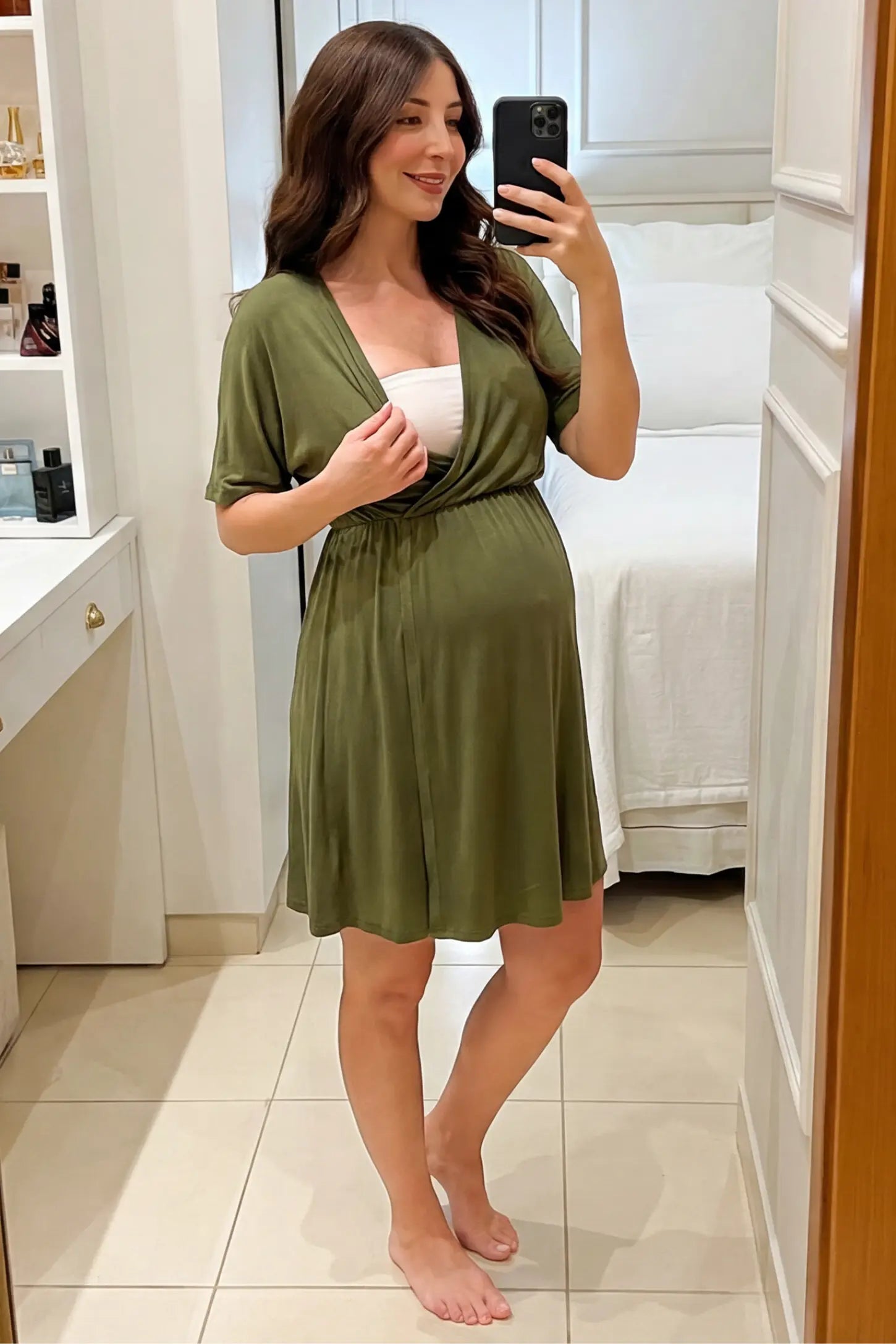Wrap Front Empire Waist Maternity & Nursing Mini Dress Wrap Front Empire Waist Maternity & Nursing Dress in army green featuring a draped crossover V-neck and short sleeves on pregnant model.