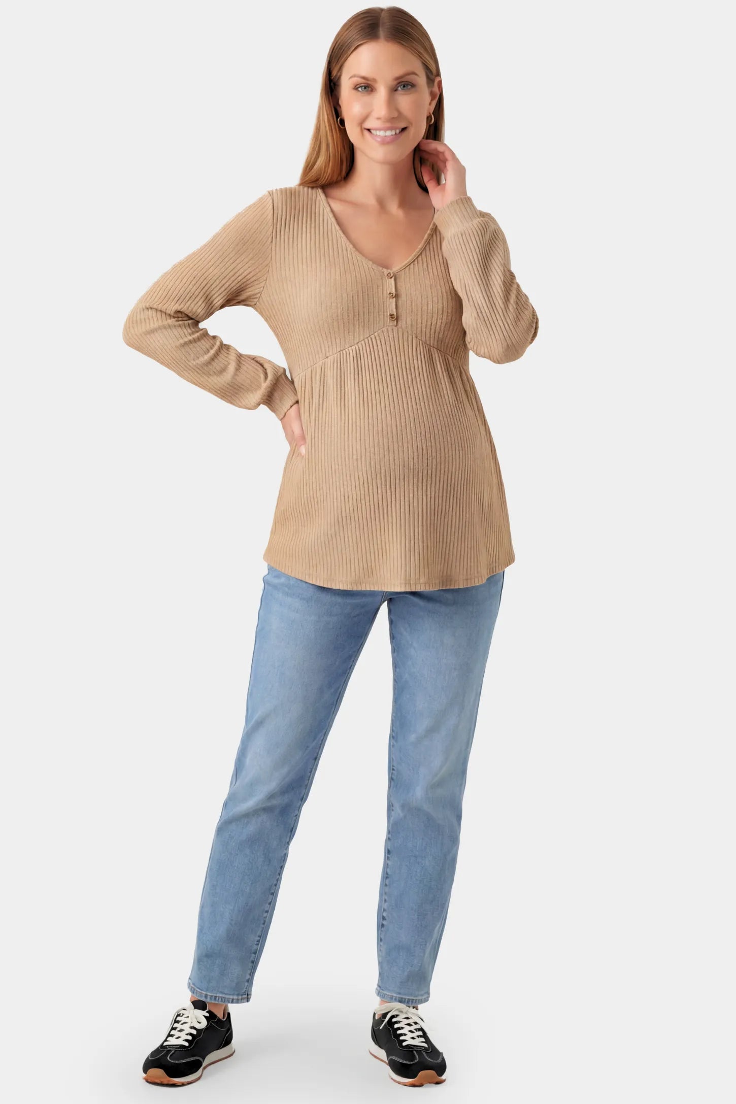 Ribbed Knit Empire Waist Maternity Top Ribbed Knit Empire Waist Maternity Top in khaki featuring a v-neckline and ribbed knit texture on a pregnant model.