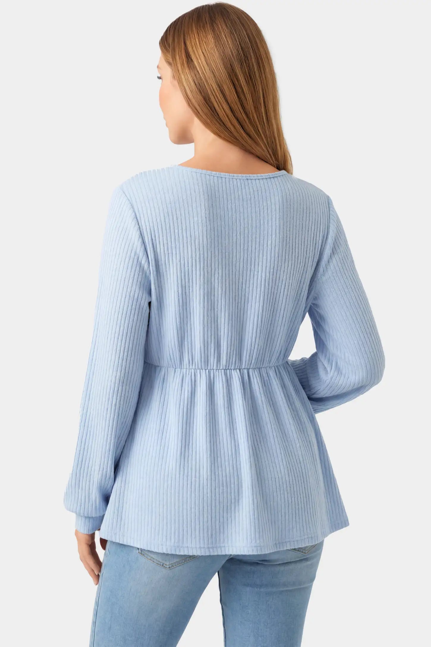 Ribbed Knit Empire Waist Maternity Top Ribbed Knit Empire Waist Maternity Top in light blue featuring a v-neckline and ribbed knit texture on a pregnant model.