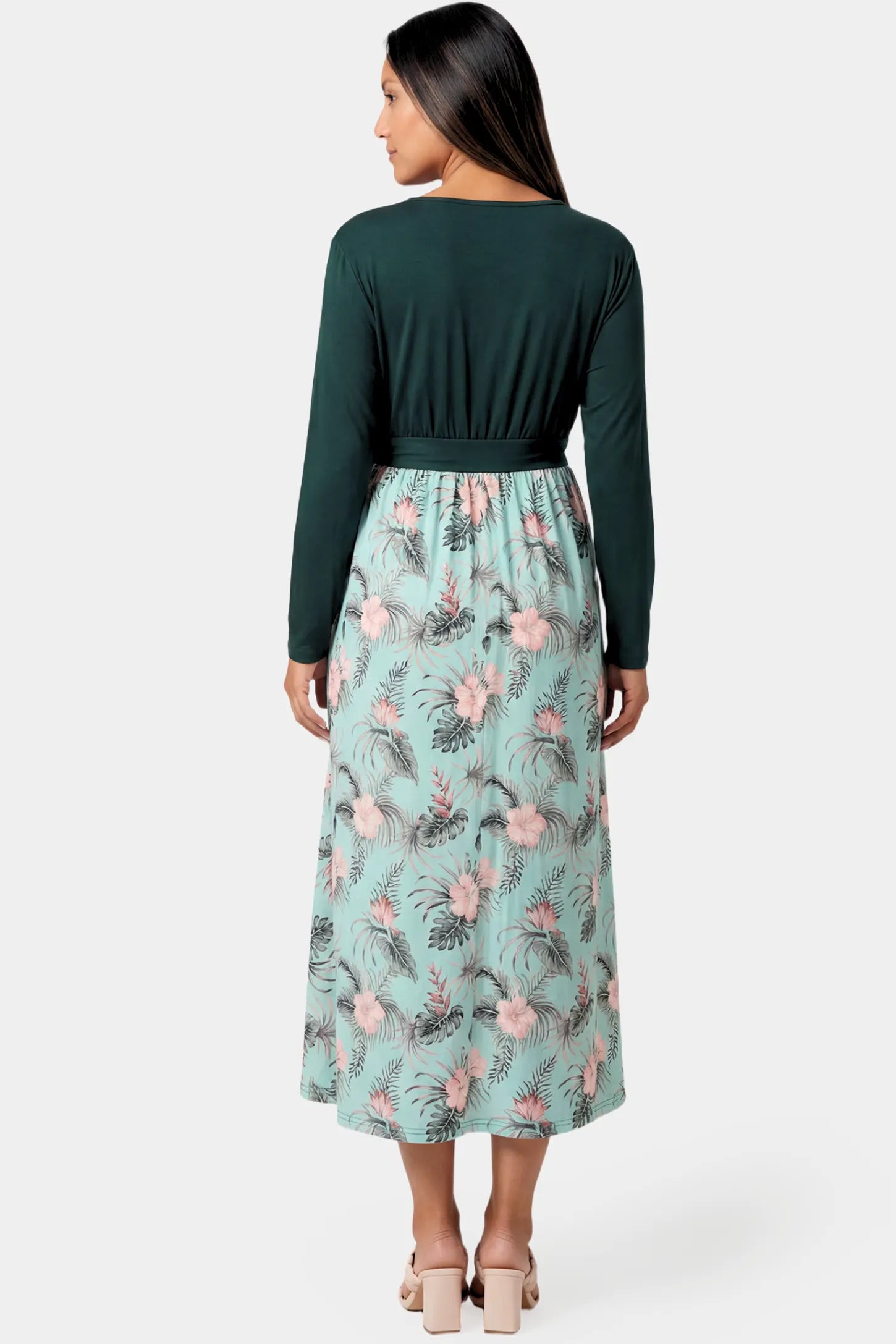 Empire Waist Faux Wrap Maternity & Nursing Midi Dress Empire Waist Faux Wrap Maternity & Nursing Midi Dress in green floral featuring long sleeves and empire waist on a pregnant model.