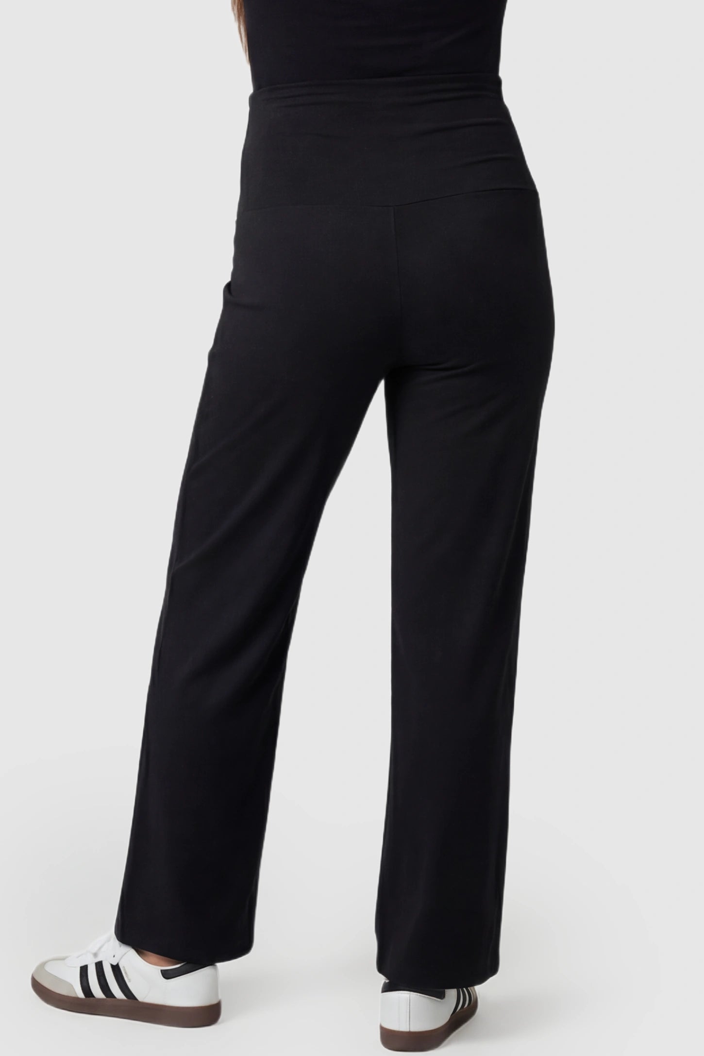 High Waist Full Panel Flare Leg Maternity Pants High Waist Full Panel Flare Leg Maternity Pants in black featuring flare legs on pregnant model.