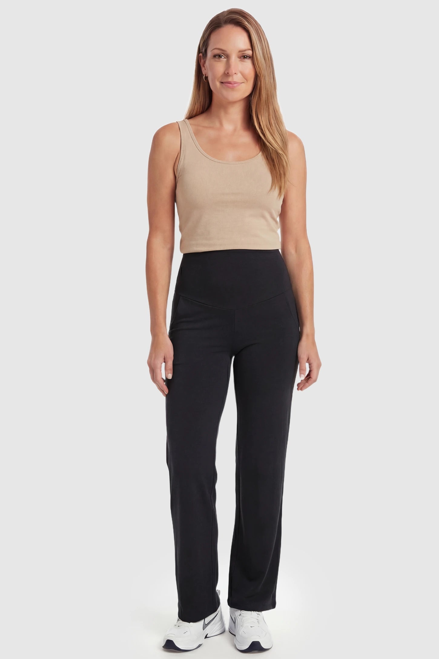 High Waist Full Panel Flare Leg Maternity Pants High Waist Full Panel Flare Leg Maternity Pants in black featuring over-the-belly high stretch fit on non pregnant model.