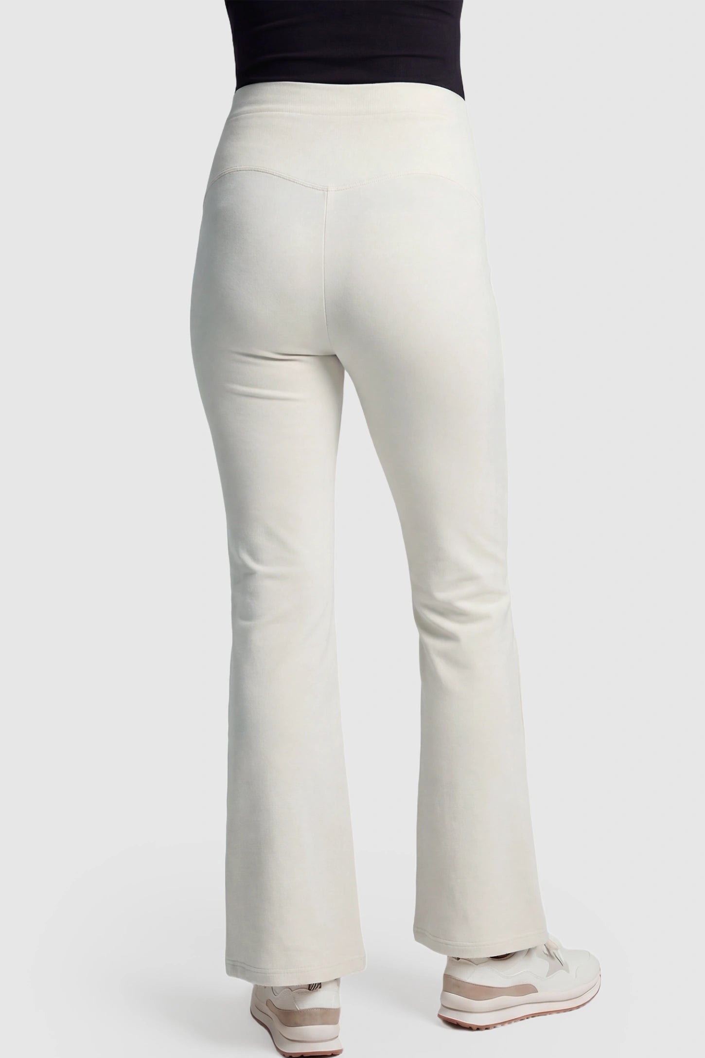 Full-Panel Flared Maternity Pants Full-Panel Flared Maternity Pants in beige featuring high-waisted bump panel and full-length bootcut silhouette on pregnant model.