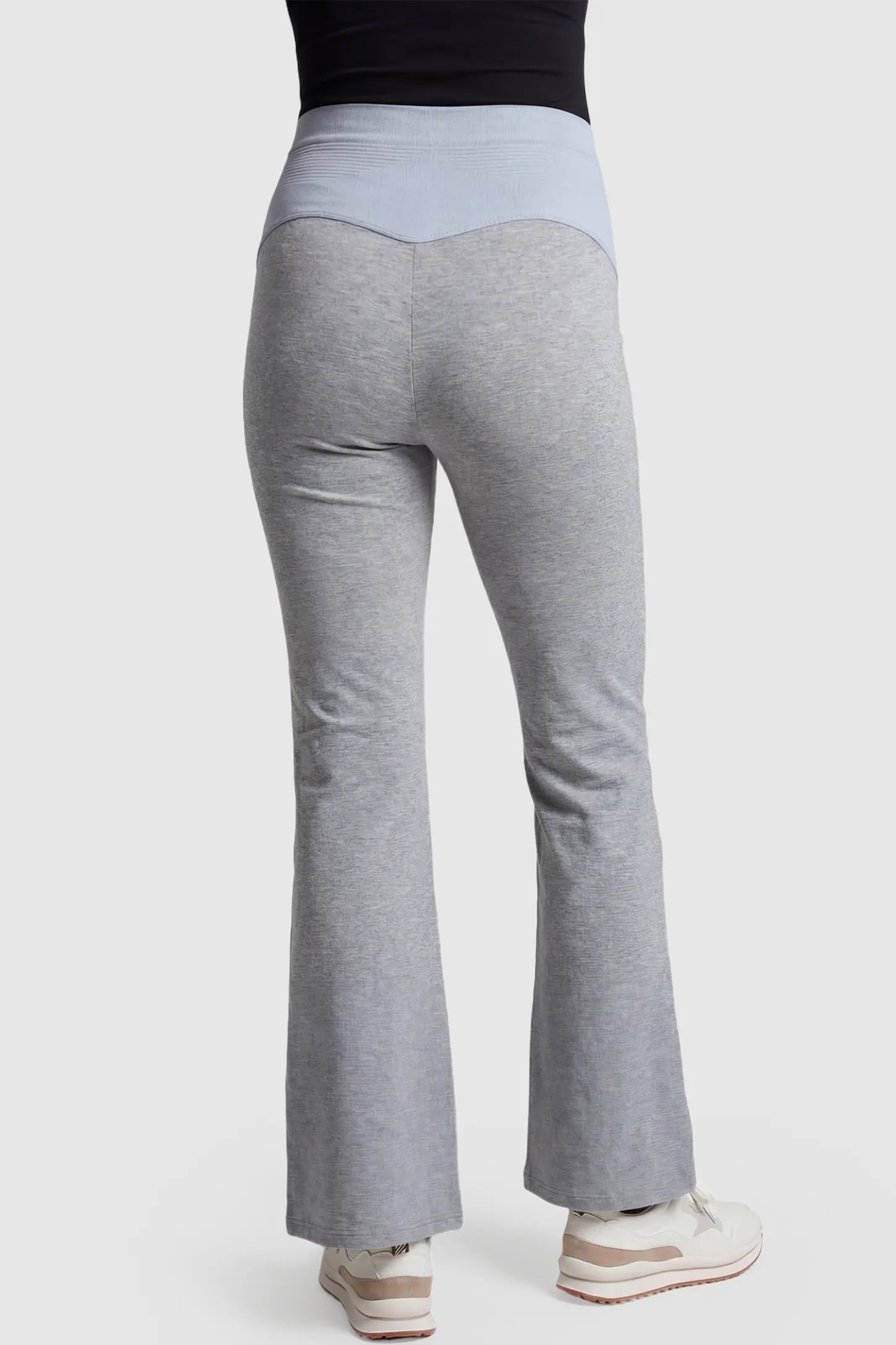 Full-Panel Flared Maternity Pants Full-Panel Flared Maternity Pants in gray featuring high-waisted bump panel and full-length bootcut silhouette on pregnant model.