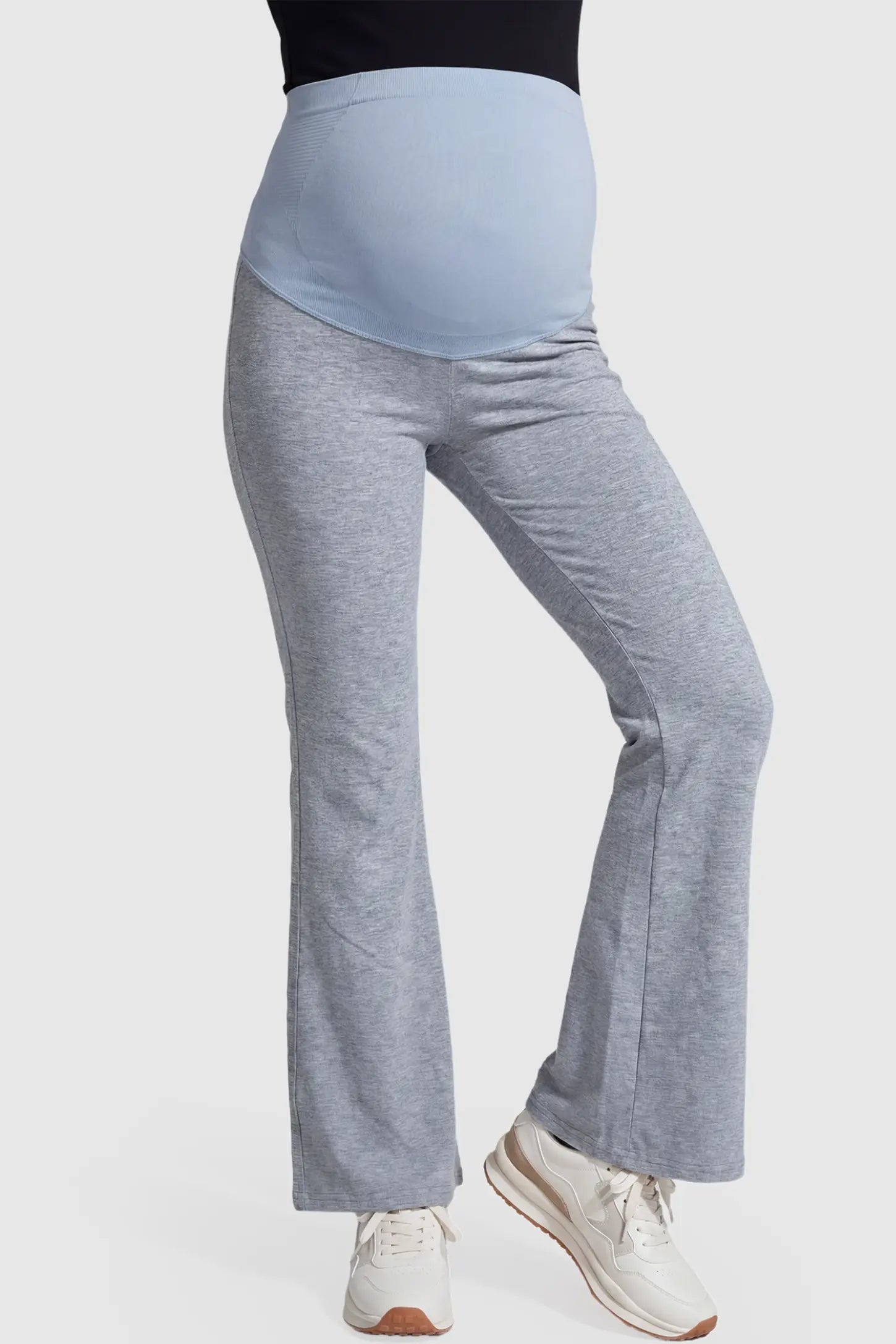 Full-Panel Flared Maternity Pants Full-Panel Flared Maternity Pants in gray featuring high-waisted bump panel and full-length bootcut silhouette on pregnant model.
