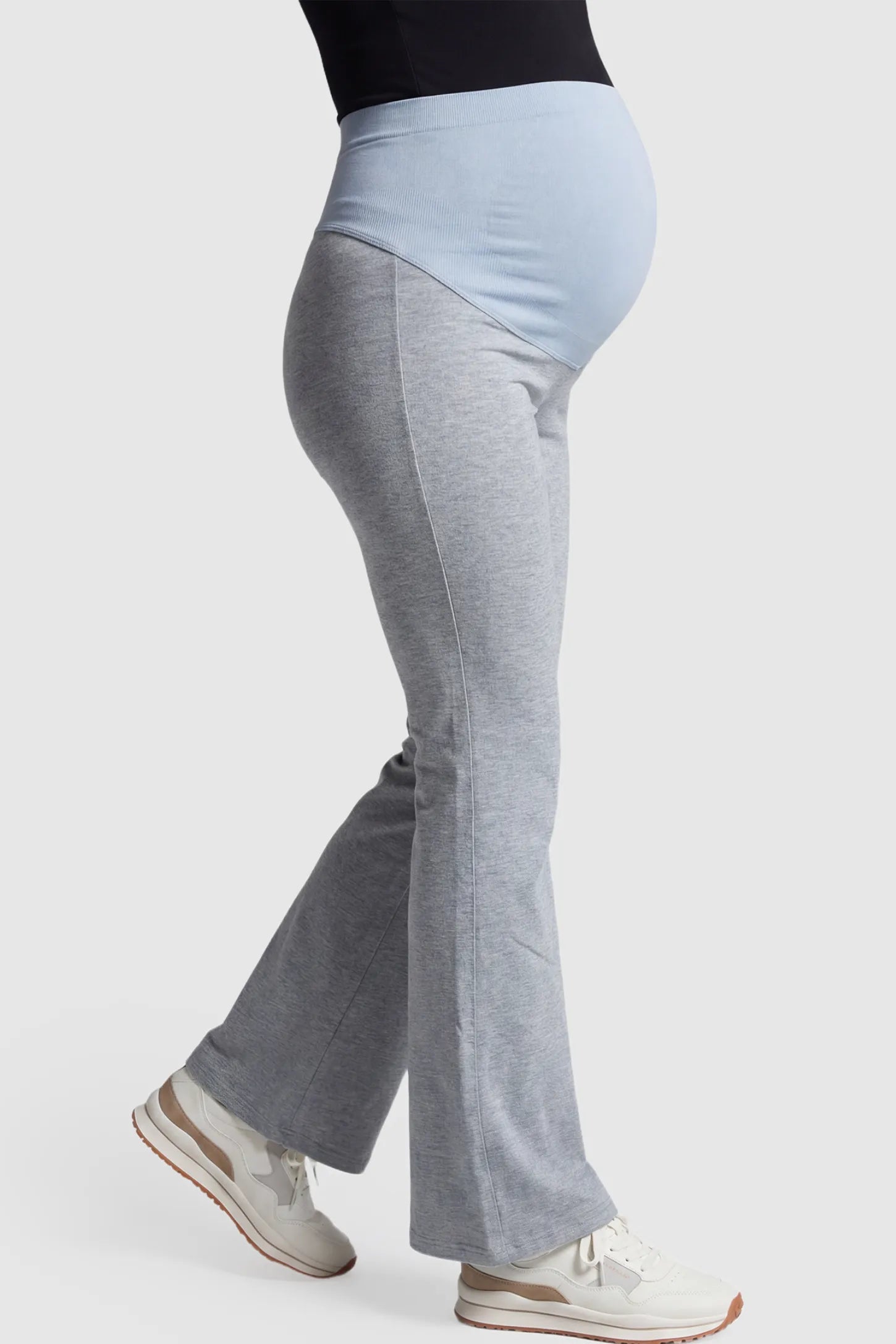 Full-Panel Flared Maternity Pants Full-Panel Flared Maternity Pants in gray featuring high-waisted bump panel and full-length bootcut silhouette on pregnant model.