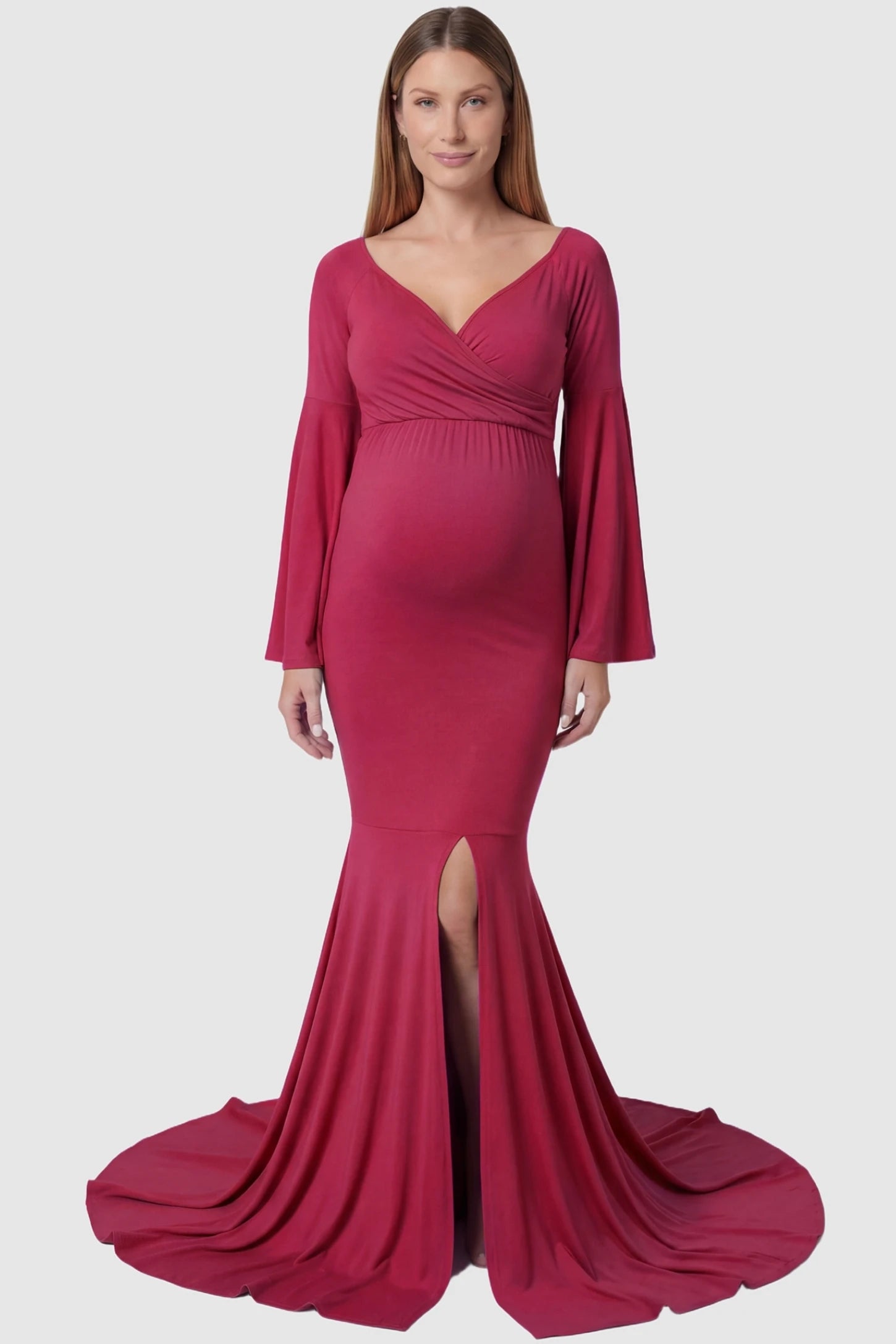 Wrap Flared Fishtail Maternity Gown Wrap Flared Fishtail Maternity Gown in Magenta featuring a sweetheart neckline on a pregnant model front view.