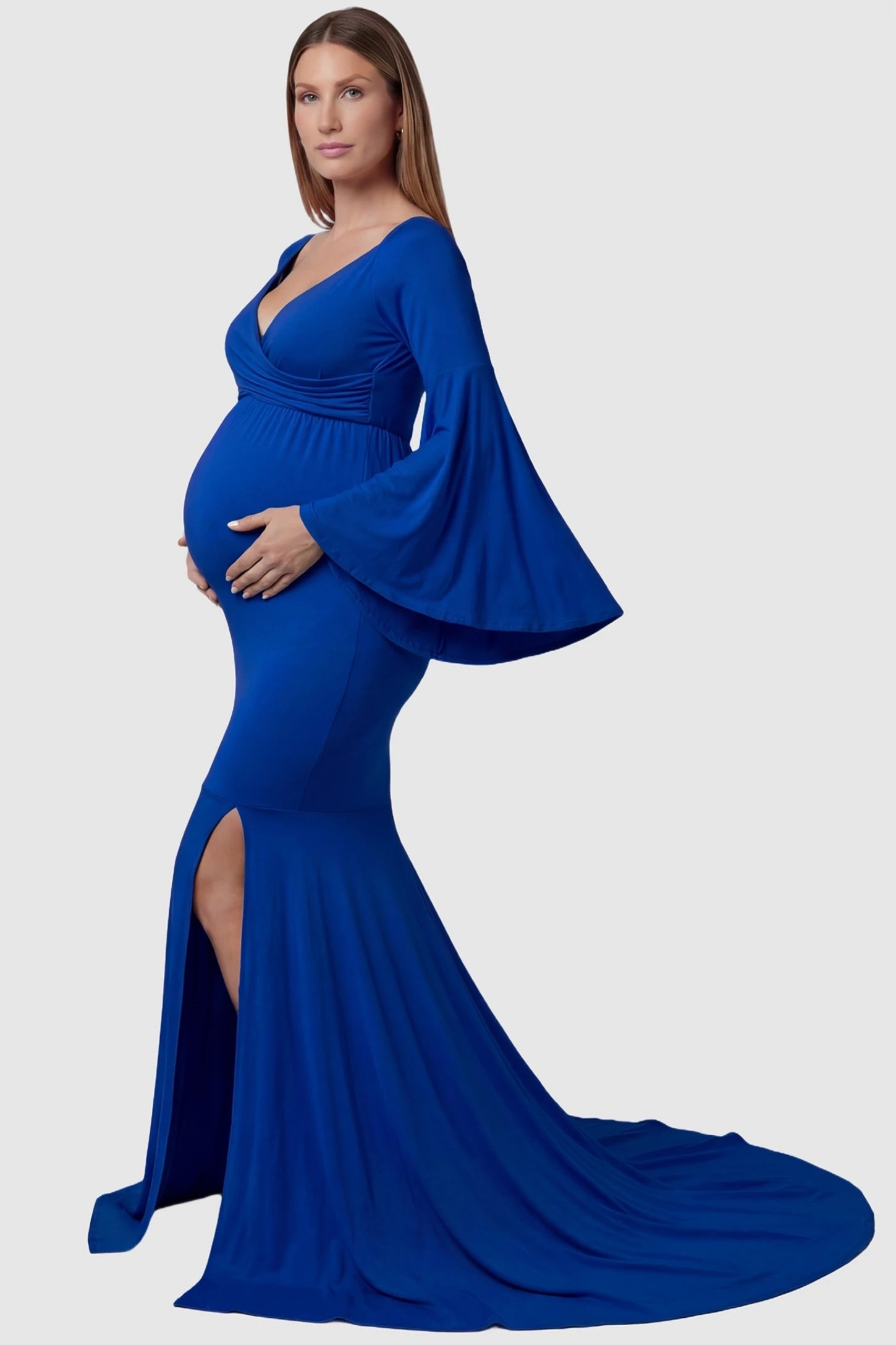 Wrap Flared Fishtail Maternity Gown Wrap Flared Fishtail Maternity Gown in Blue featuring a dramatic long train on a pregnant model side view.
