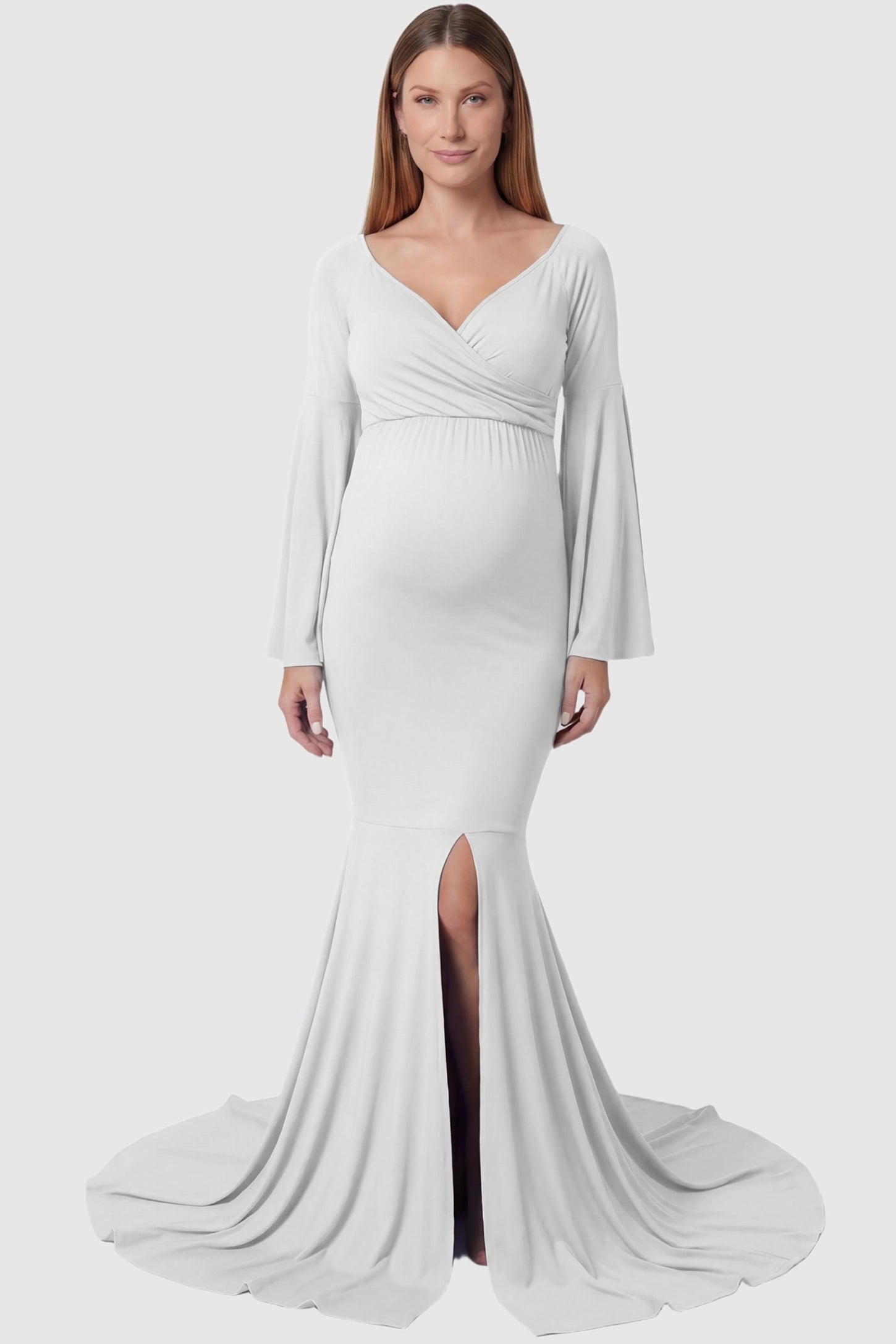 Wrap Flared Fishtail Maternity Gown Wrap Flared Fishtail Maternity Gown in White featuring a sweetheart neckline on a pregnant model front view.
