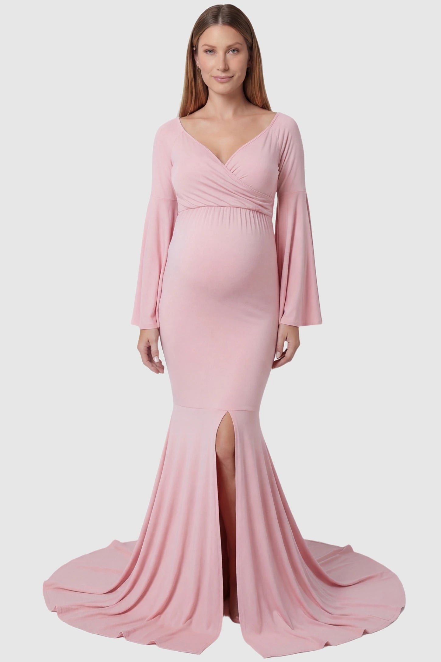 Wrap Flared Fishtail Maternity Gown Wrap Flared Fishtail Maternity Gown in Pink featuring a sweetheart neckline on a pregnant model front view.
