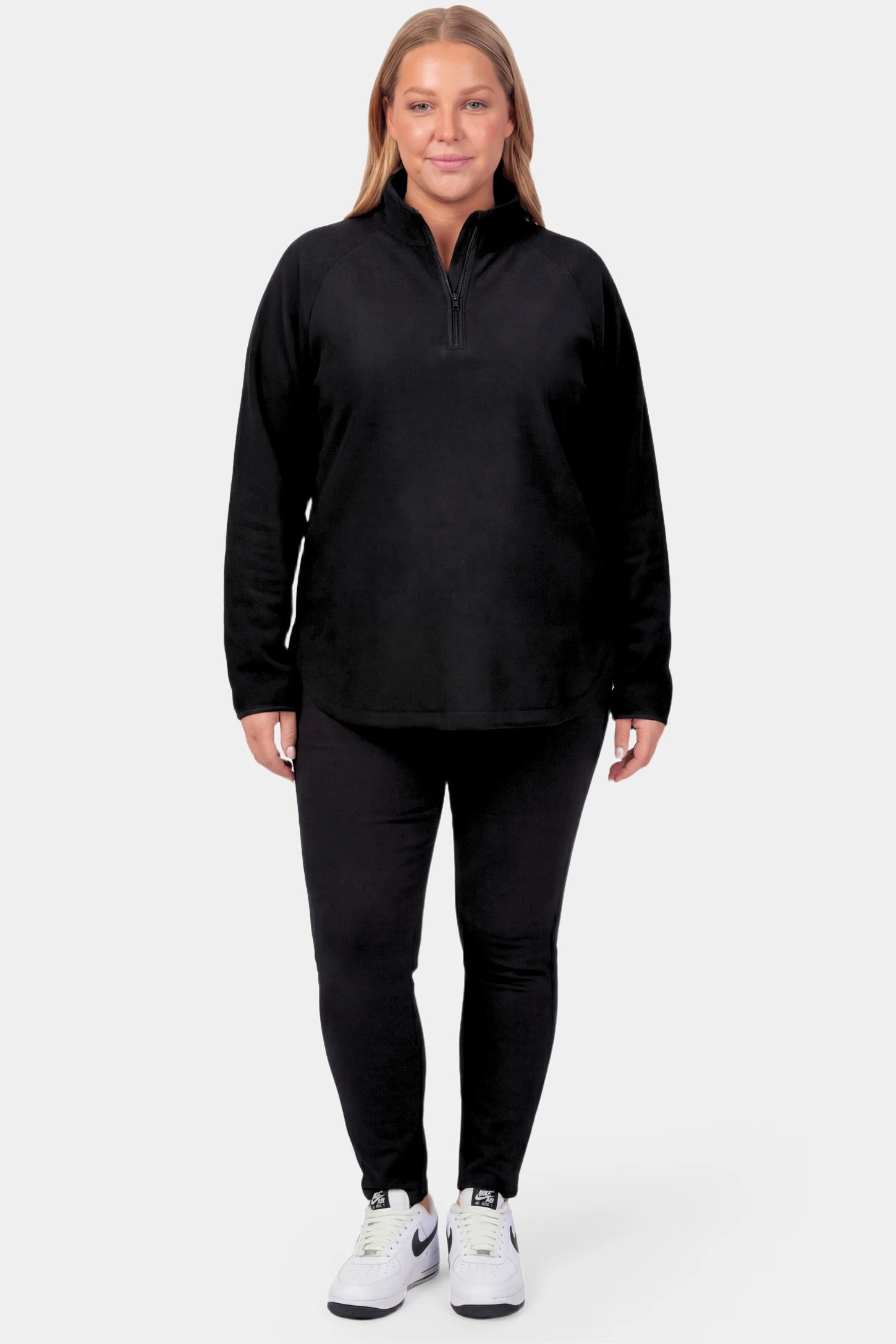 Fleece Mock Neck with Half-Zip Maternity Sweater Fleece Mock Neck with Half-Zip Maternity Sweater in black featuring a mock neck and half-zip detail on a pregnant model.