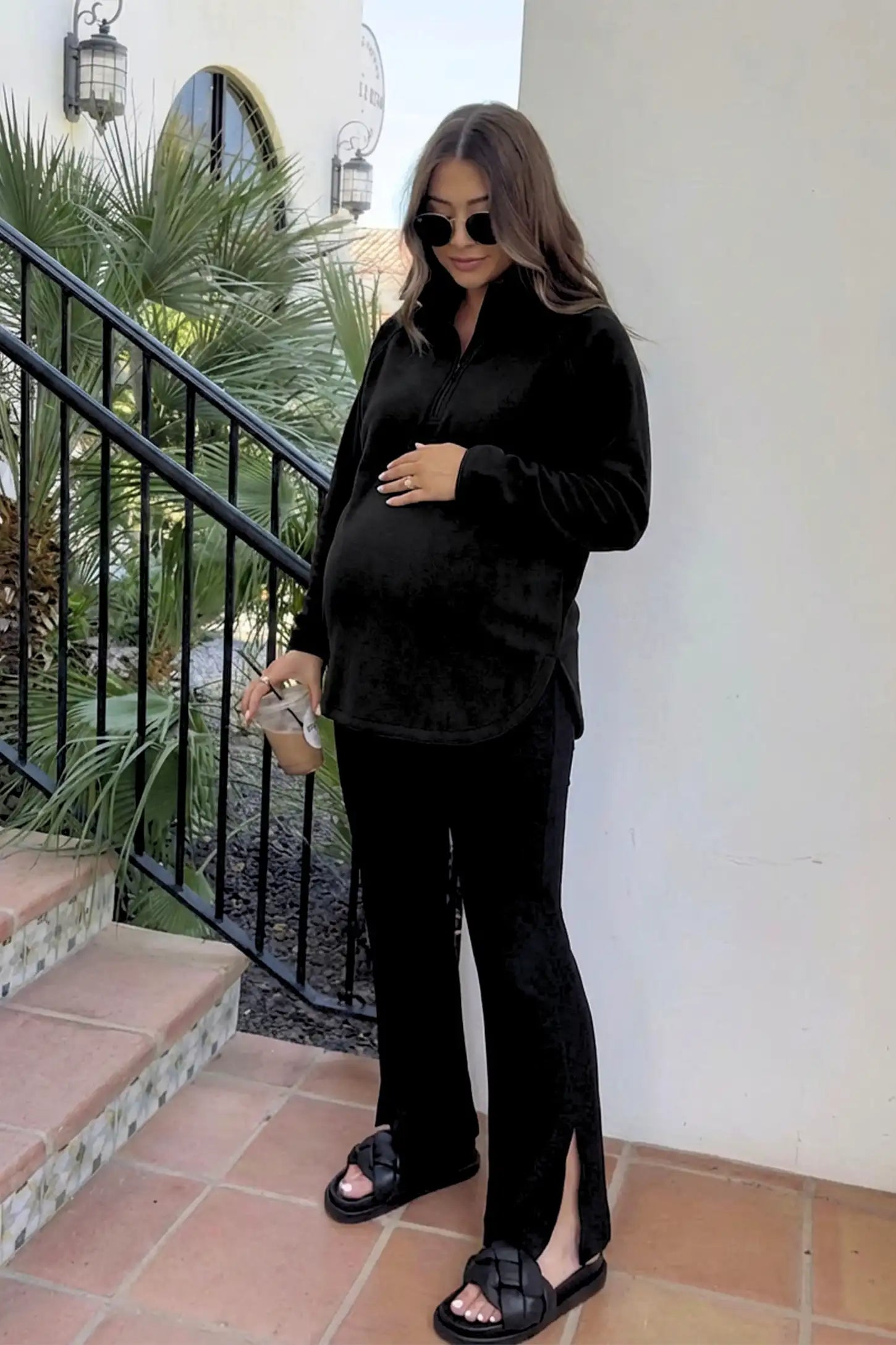 Fleece Mock Neck with Half-Zip Maternity Sweater Fleece Mock Neck with Half-Zip Maternity Sweater in black featuring a mock neck and half-zip detail on a pregnant model.