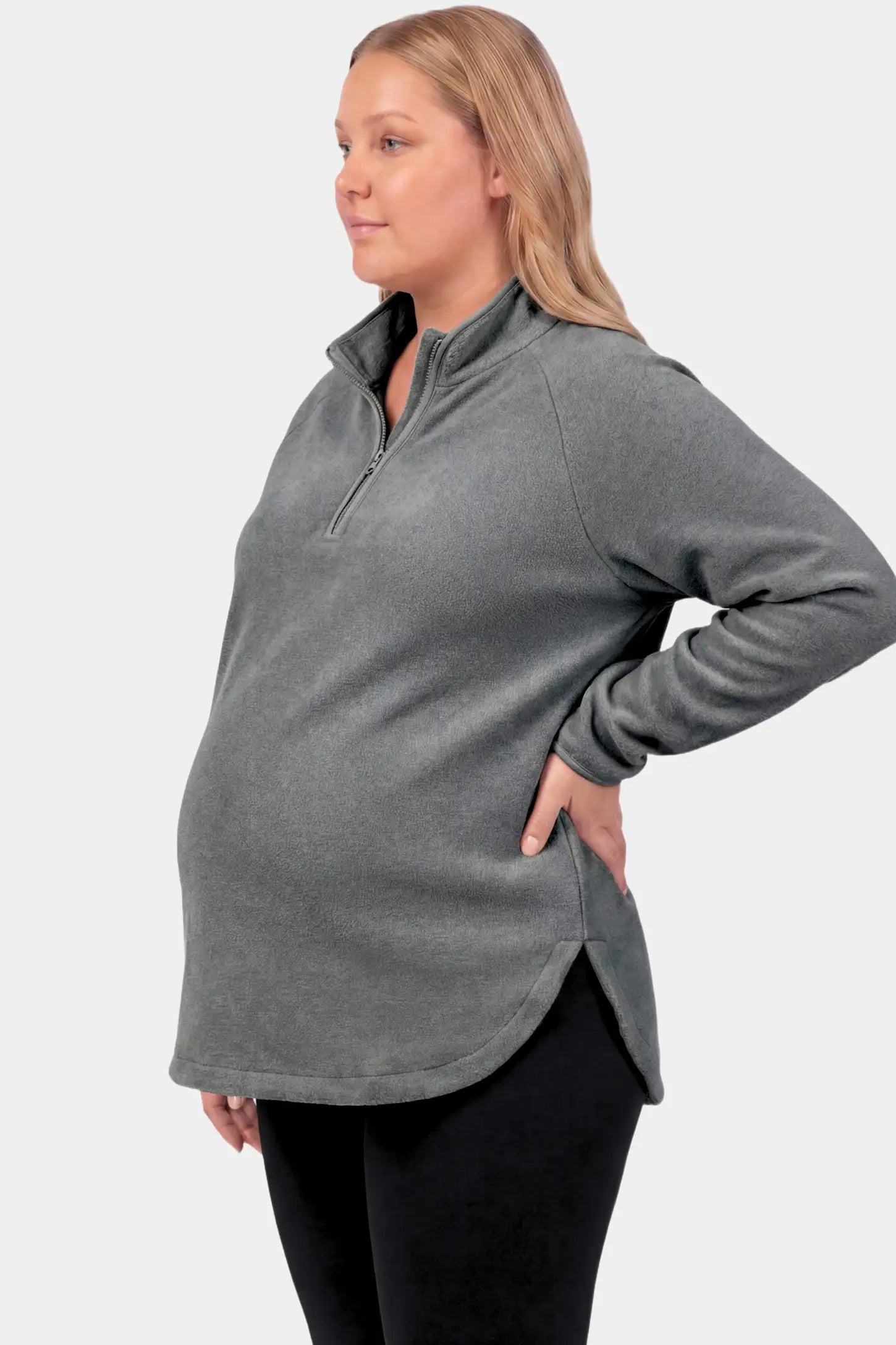 Fleece Mock Neck with Half-Zip Maternity Sweater Fleece Mock Neck with Half-Zip Maternity Sweater in light gray featuring a mock neck and half-zip detail on a pregnant model.