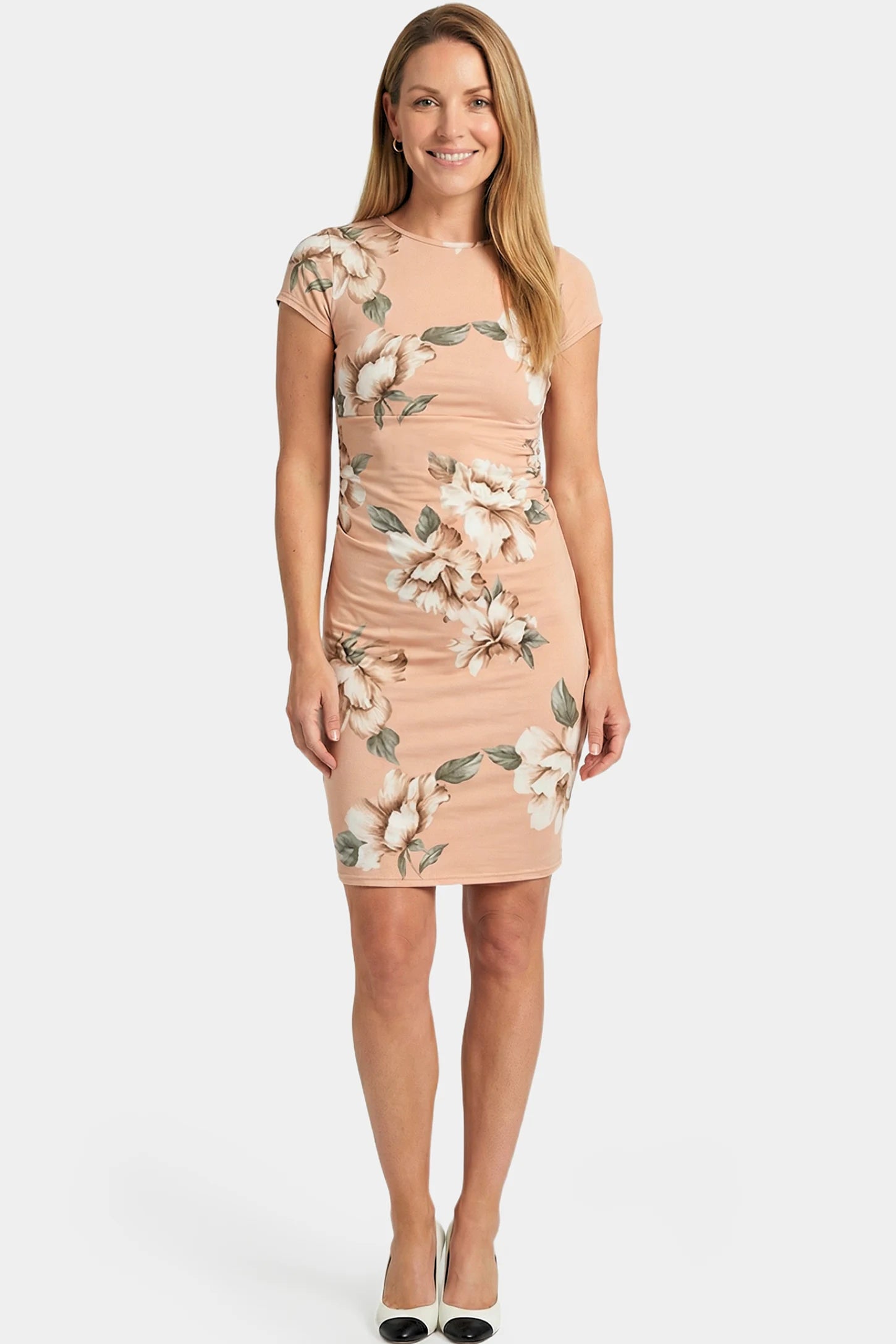 Floral Ruched Bodycon Maternity Short Dress Floral Ruched Bodycon Maternity Short Dress in pink floral featuring side ruching on a non pregnant model.