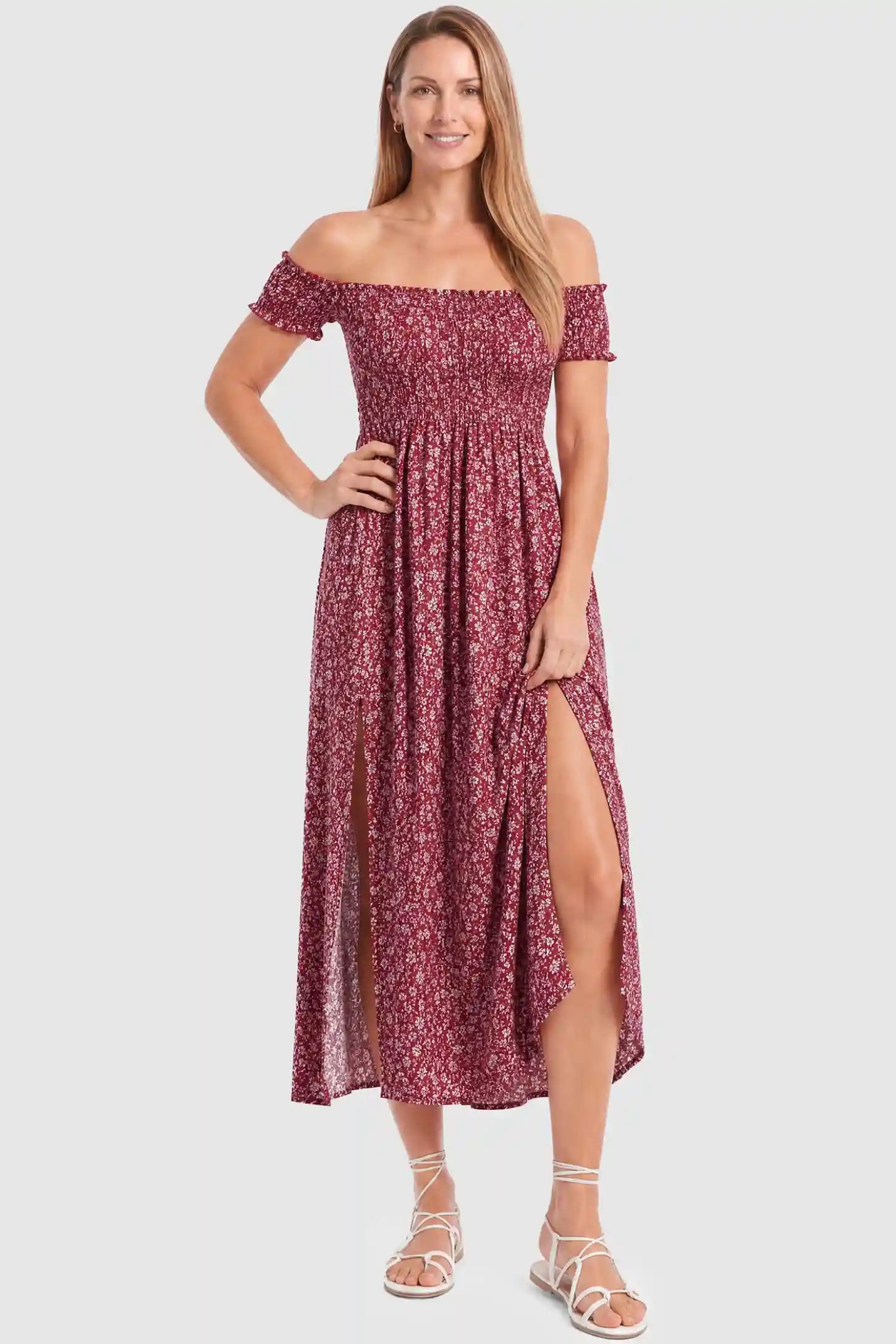Floral Off-Shoulder Smocked Bodice Maxi Maternity Dress Floral off-shoulder smocked bodice maxi maternity dress in burgundy featuring smocked neckline in front view on a postpartum model