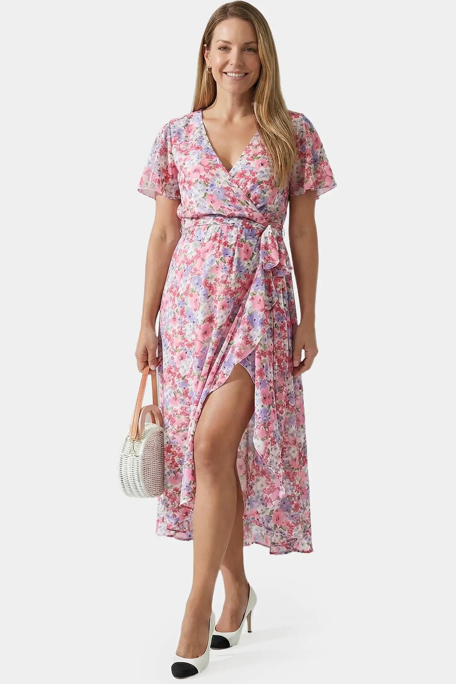 Floral V-Neck Ruffled Hem Midi Maternity Dress Floral V-neck ruffled hem midi maternity dress in pink featuring V-neckline and tie waist in full body front view on a postpartum model
