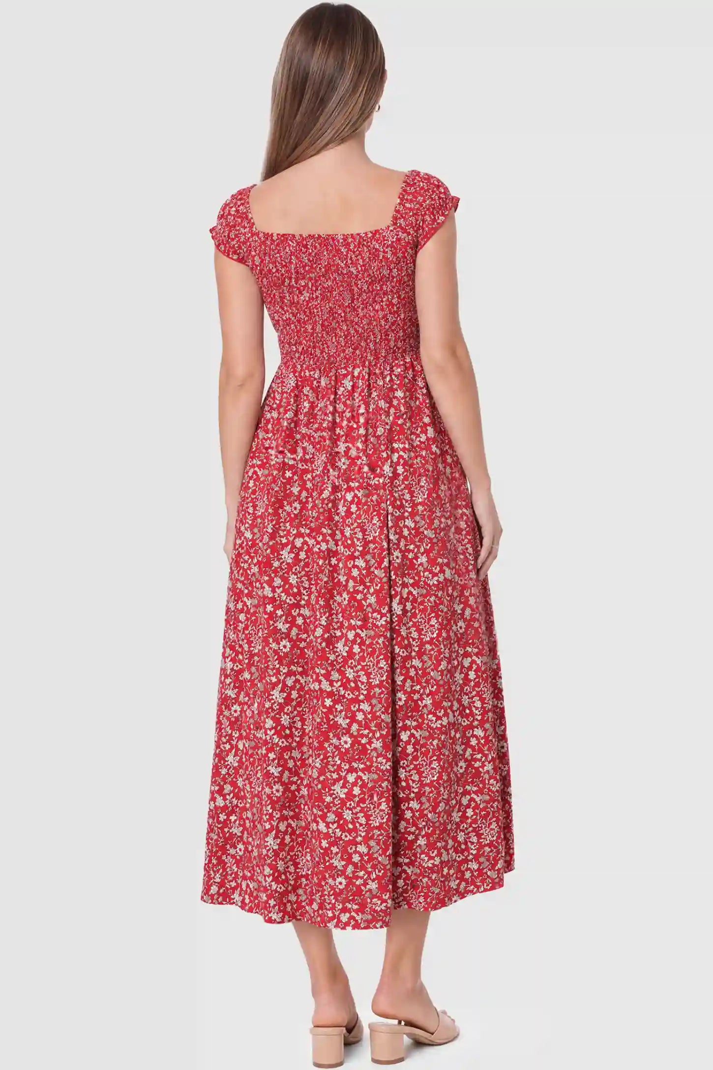 Floral Off-Shoulder Smocked Bodice Maxi Maternity Dress Floral off-shoulder smocked bodice maxi maternity dress in red featuring elastic smocked back in back view on a pregnant model