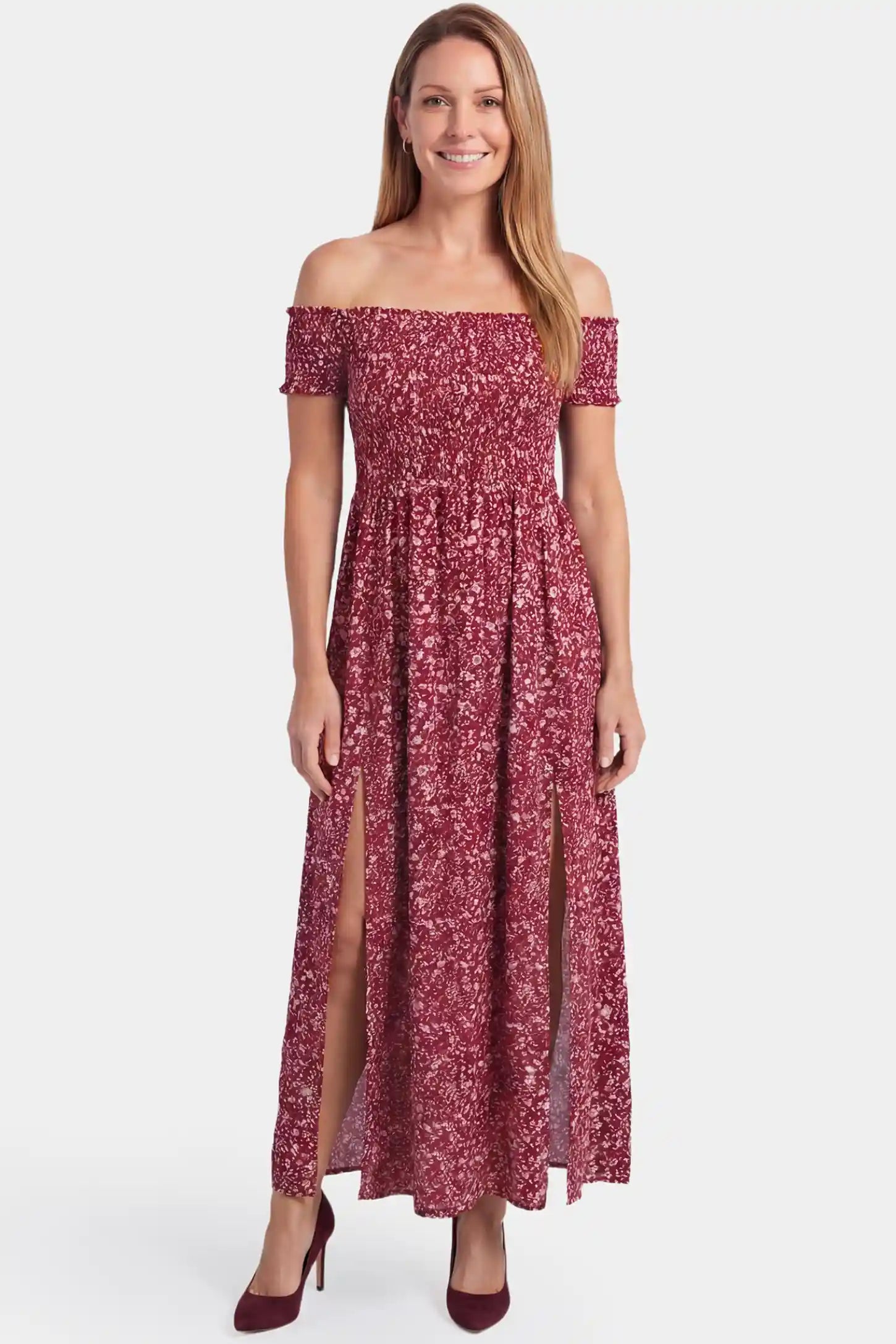 Floral Off-Shoulder Smocked Bodice Maxi Maternity Dress Floral off-shoulder smocked bodice maxi maternity dress in red featuring relaxed summer fit in full body view on a postpartum model