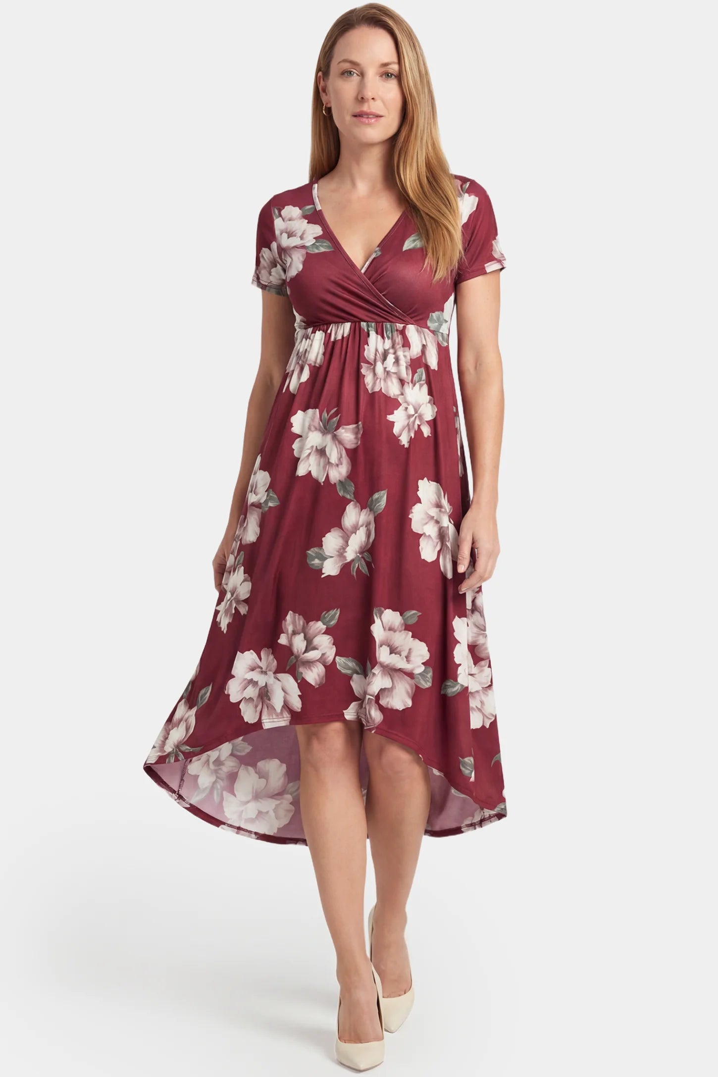 Floral V-Neck Wrap High-Low Maxi Maternity Dress Floral V-neck wrap high-low maxi maternity dress in wine red floral featuring V-neck wrap-style front in front view on a postpartum model