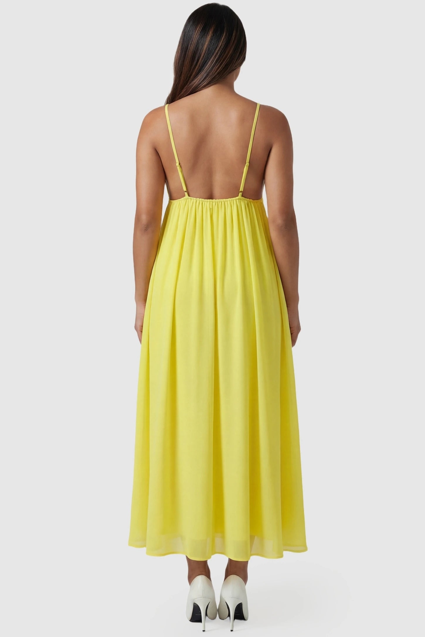 Yellow Floral Embroidered Chiffon Maternity Maxi Dress Floral Embroidered Chiffon Maternity Maxi Dress in Yellow featuring an open-back design on a pregnant model back view.