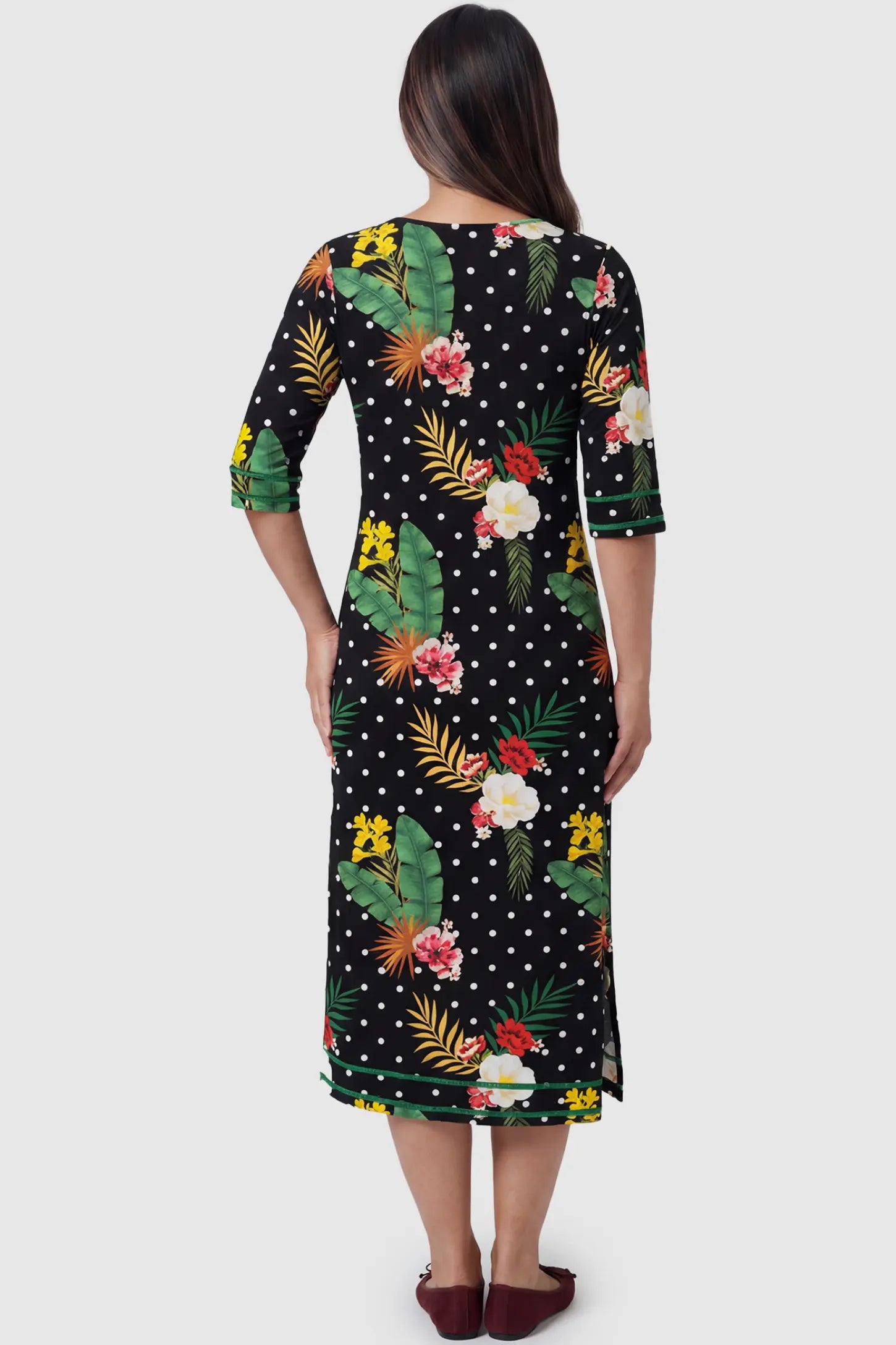 Front-Zip Floral & Polka Dot Maternity & Nursing Midi Lounge Dress Front-Zip Floral & Polka Dot Maternity & Nursing Midi Lounge Dress  in black with white dots and green floral print featuring A-line silhouette on pregnant model.