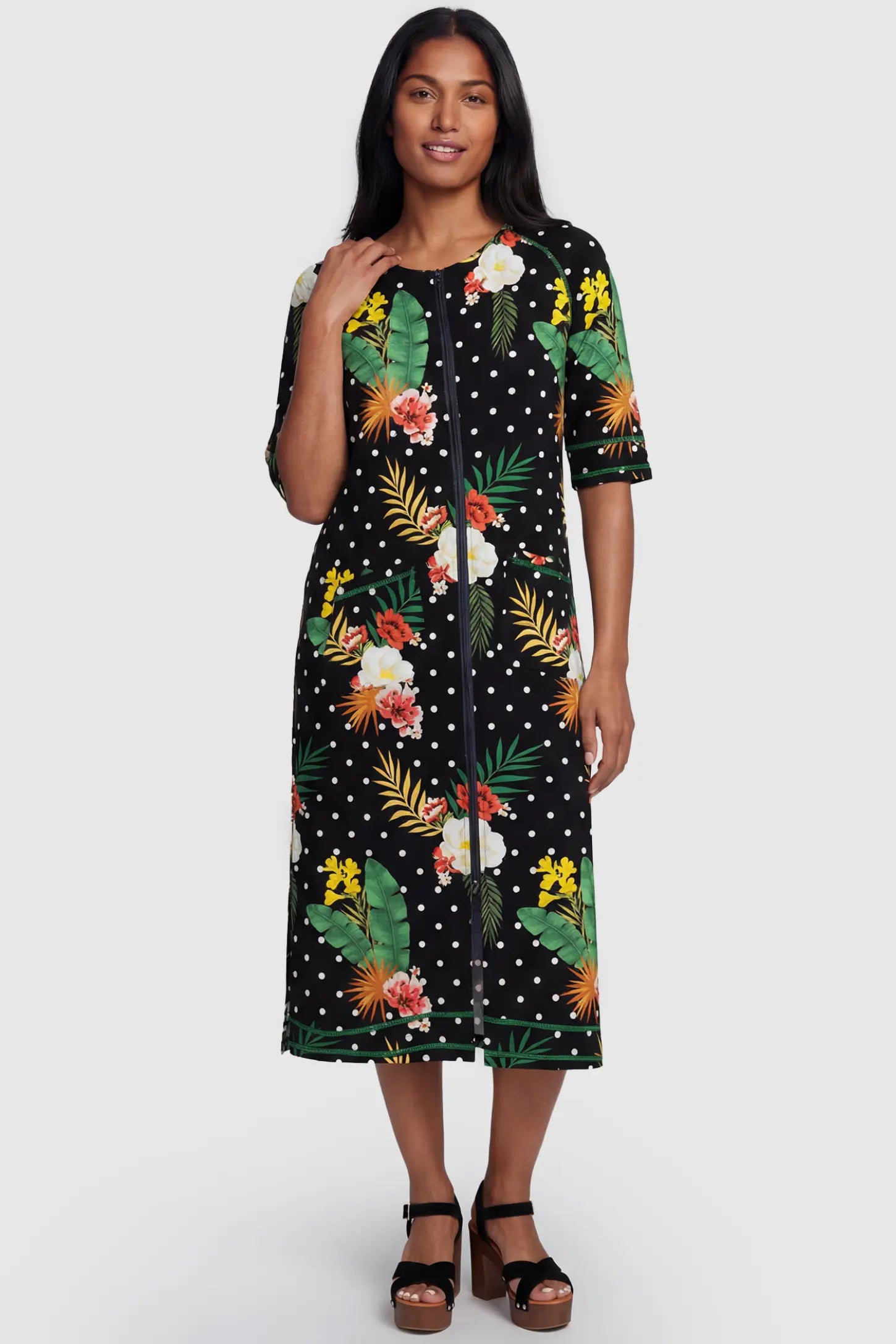 Front-Zip Floral & Polka Dot Maternity & Nursing Midi Lounge Dress Front-Zip Floral & Polka Dot Maternity & Nursing Midi Lounge Dress  in black with white dots and green floral print featuring full zipper closure and A-line silhouette on postpartum pregnant model.