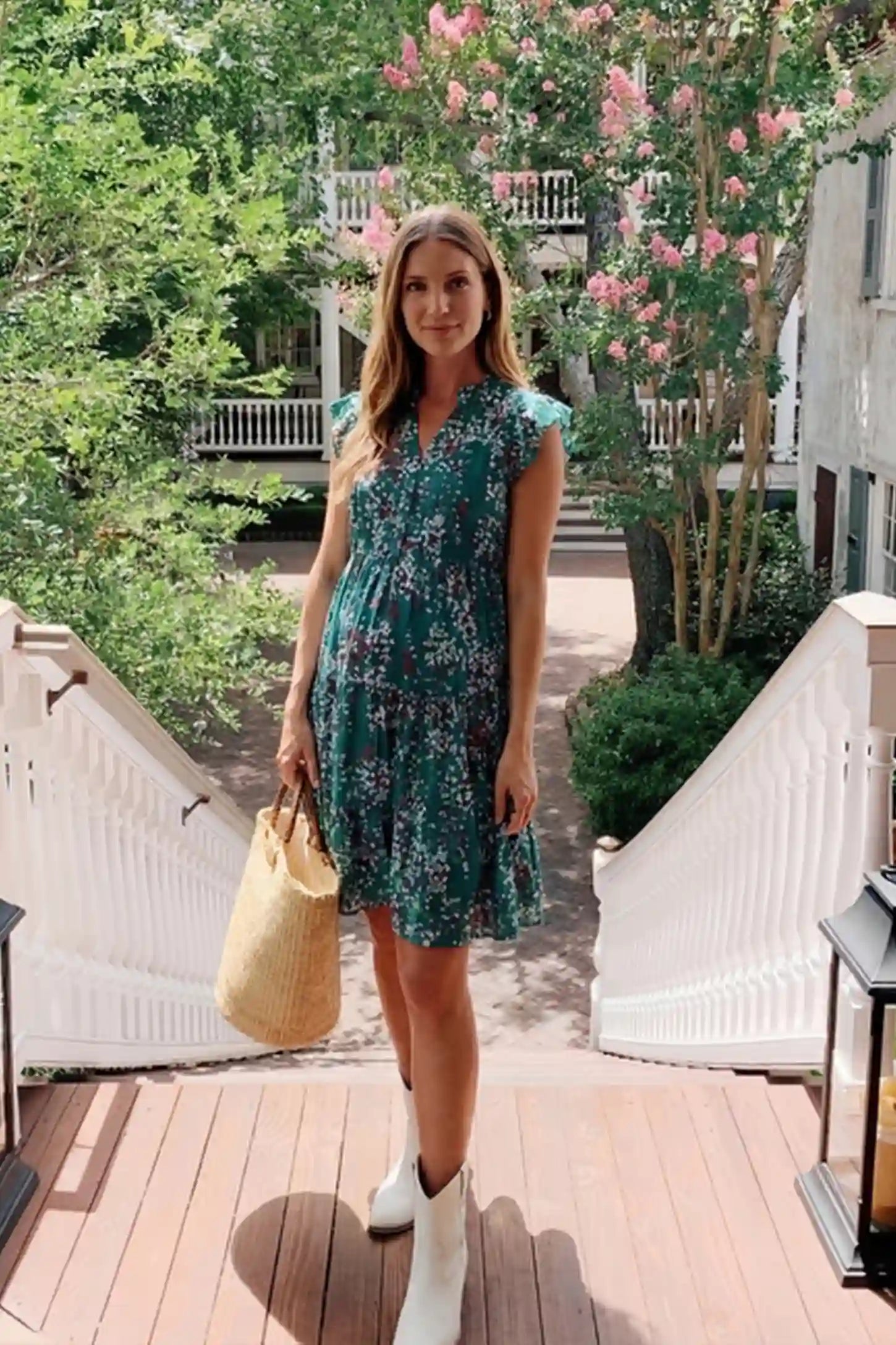 Floral V-Neck A-Line Short Maternity Dress Floral V-neck A-line short maternity dress in green with airy chiffon flow, on editorial lifestyle model