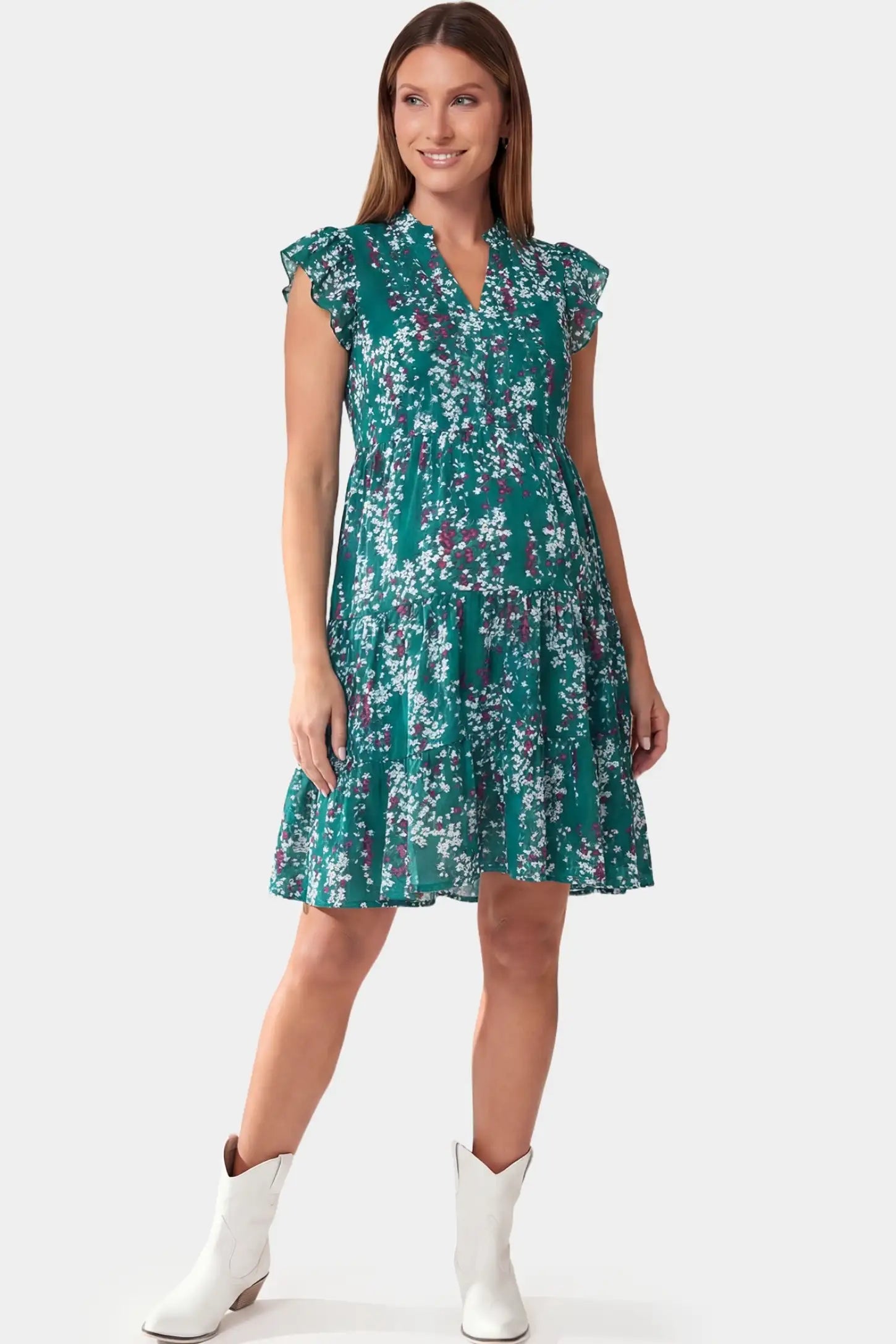 Floral V-Neck A-Line Short Maternity Dress Floral V-Neck A-Line Short Maternity Dress in green featuring chiffon fabric in full body front view on a pregnant model