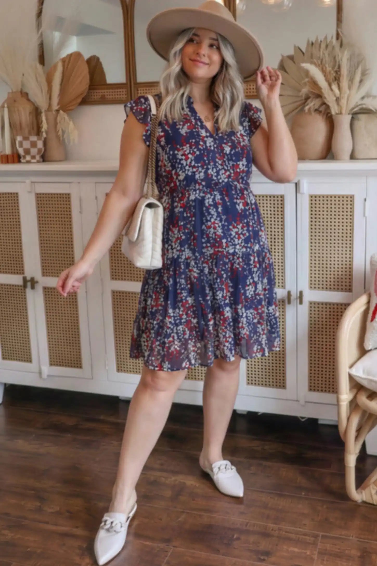 Floral V-Neck A-Line Short Maternity Dress Floral V-neck A-line short maternity dress in navy with soft floral print, on UGC model