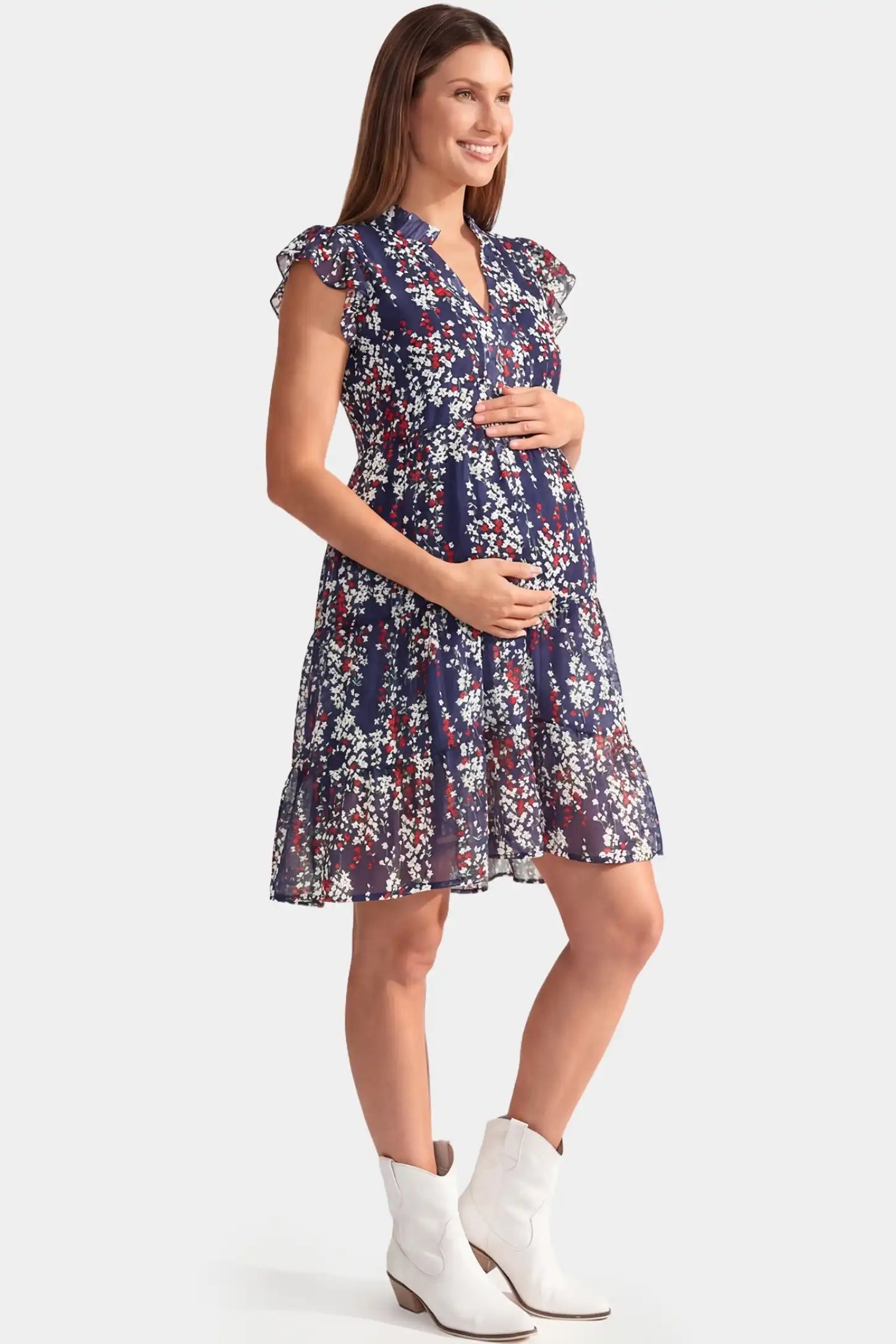 Floral V-Neck A-Line Short Maternity Dress Floral V-Neck A-Line Short Maternity Dress in navy featuring flutter sleeves in full body side view on a pregnant model