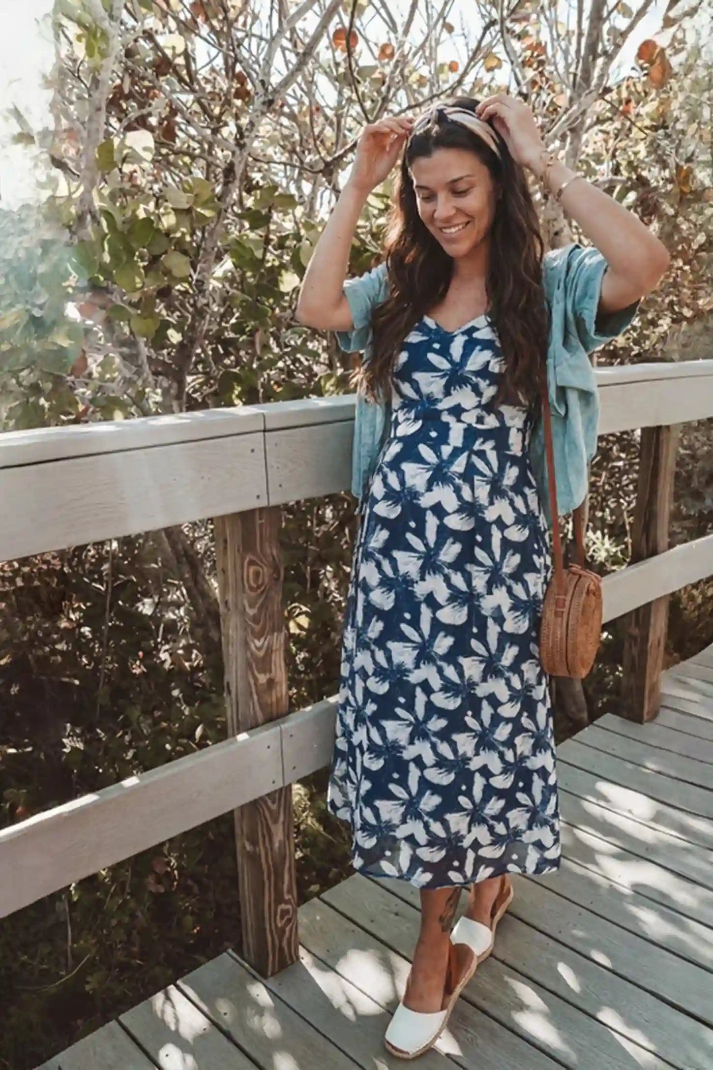 Floral Print Square Neck Fit and Flare Maternity Midi Dress Floral Print Square Neck Fit and Flare Maternity Midi Dress in blue featuring a botanical print on a pregnant model in an outdoor setting.