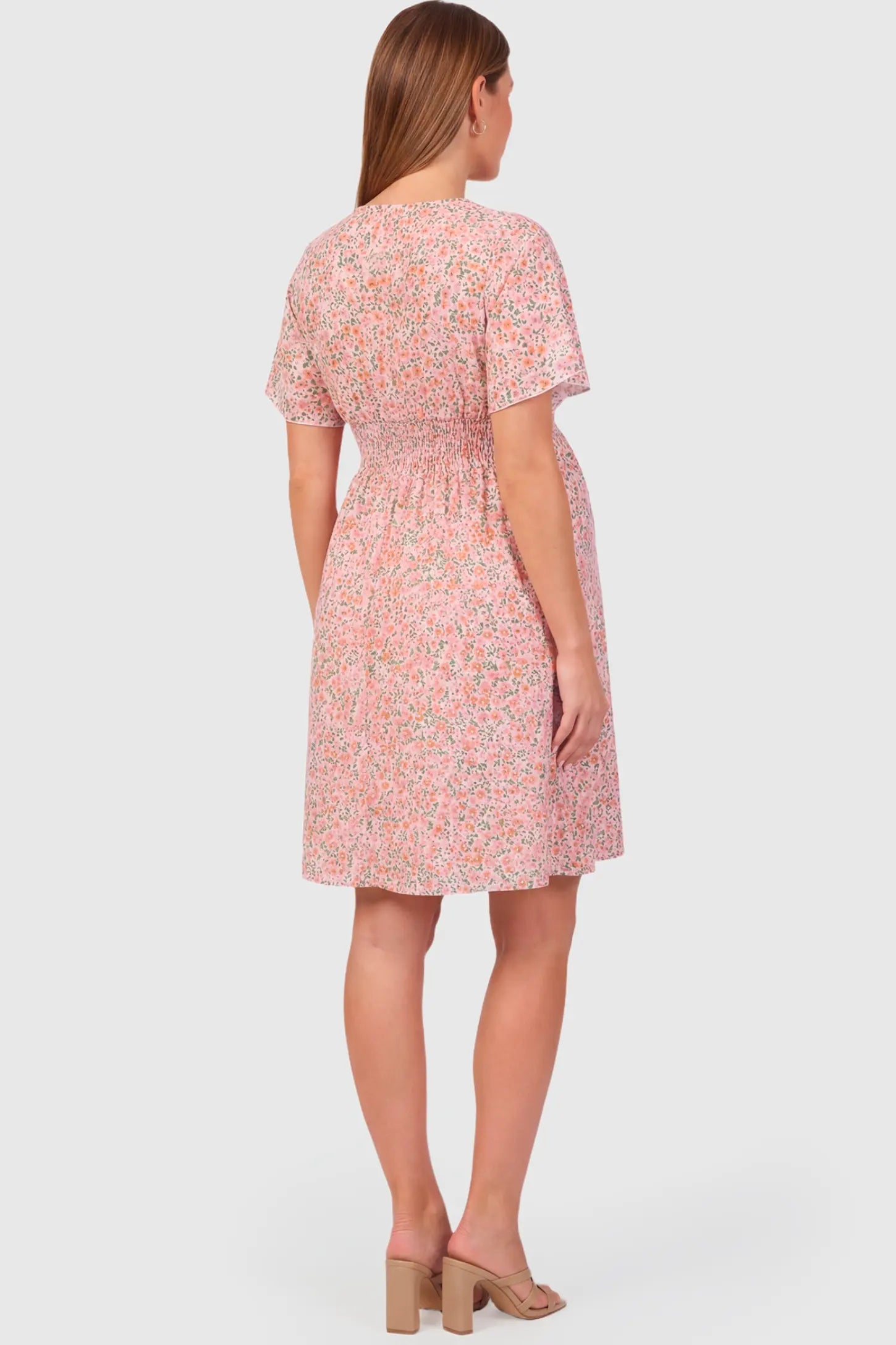 Short Sleeve A-Line Maternity Short Dress Short Sleeve A-Line Maternity Short Dress in pink floral featuring an empire waist on pregnant model.