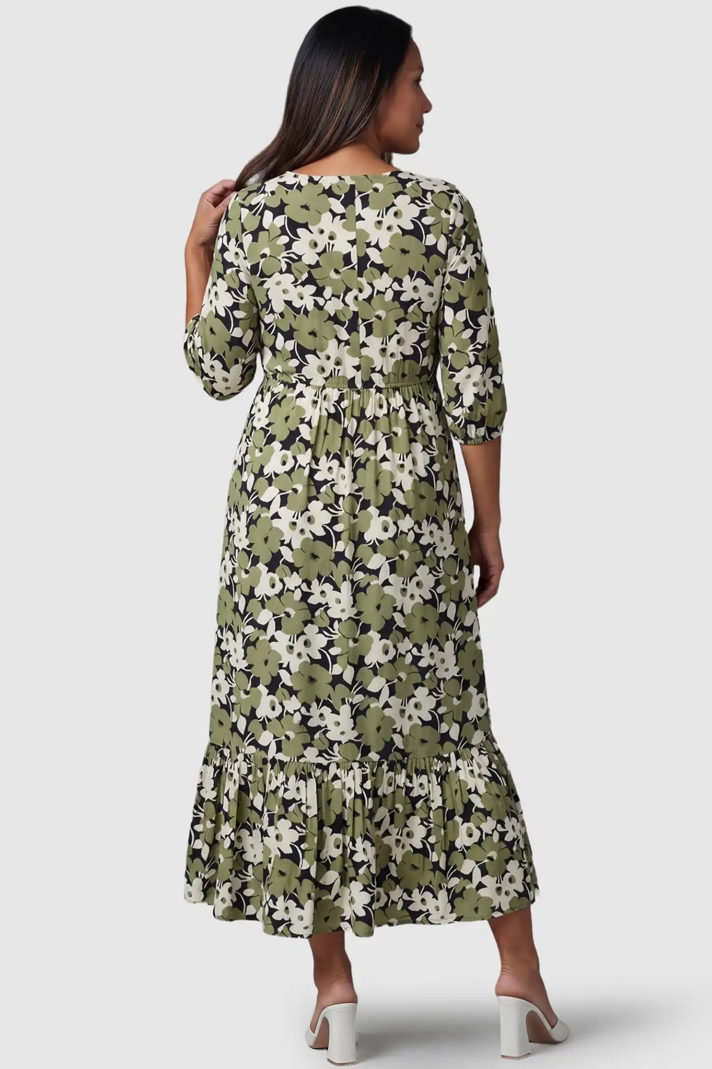 Floral Square Neck Tiered Midi Maternity Dress Floral Square Neck Tiered Midi Maternity Dress in green floral featuring an elasticized waist on a back-view pregnant model.