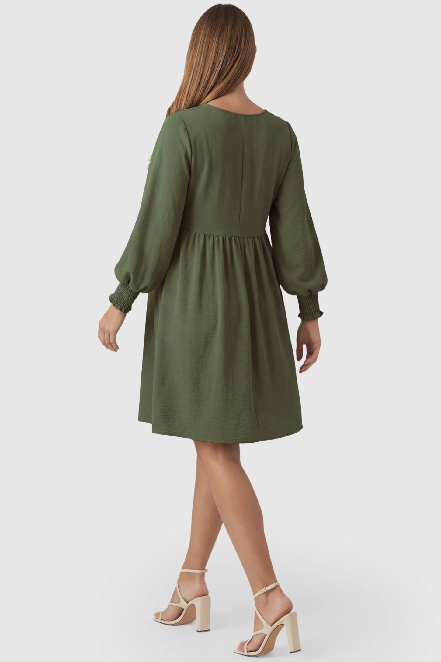 Balloon Sleeve Empire Waist Maternity Midi Dress Balloon Sleeve Empire Waist Maternity Midi Dress in army green featuring smocked elastic cuff sleeves and soft drape on a pregnant model, back view.