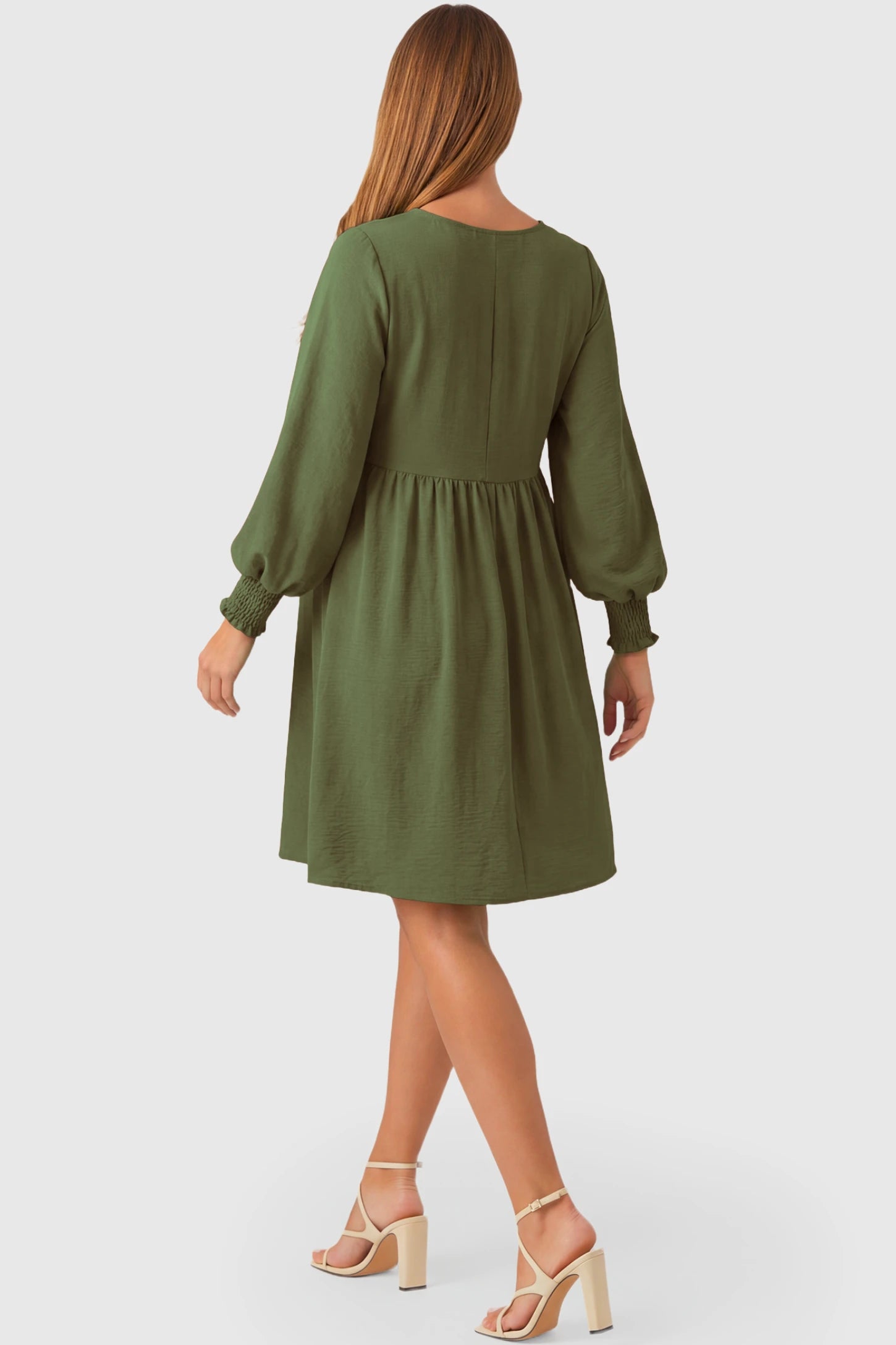 Balloon Sleeve Empire Waist Maternity Midi Dress Balloon Sleeve Empire Waist Maternity Midi Dress in army green featuring smocked elastic cuff sleeves and soft drape on a pregnant model.