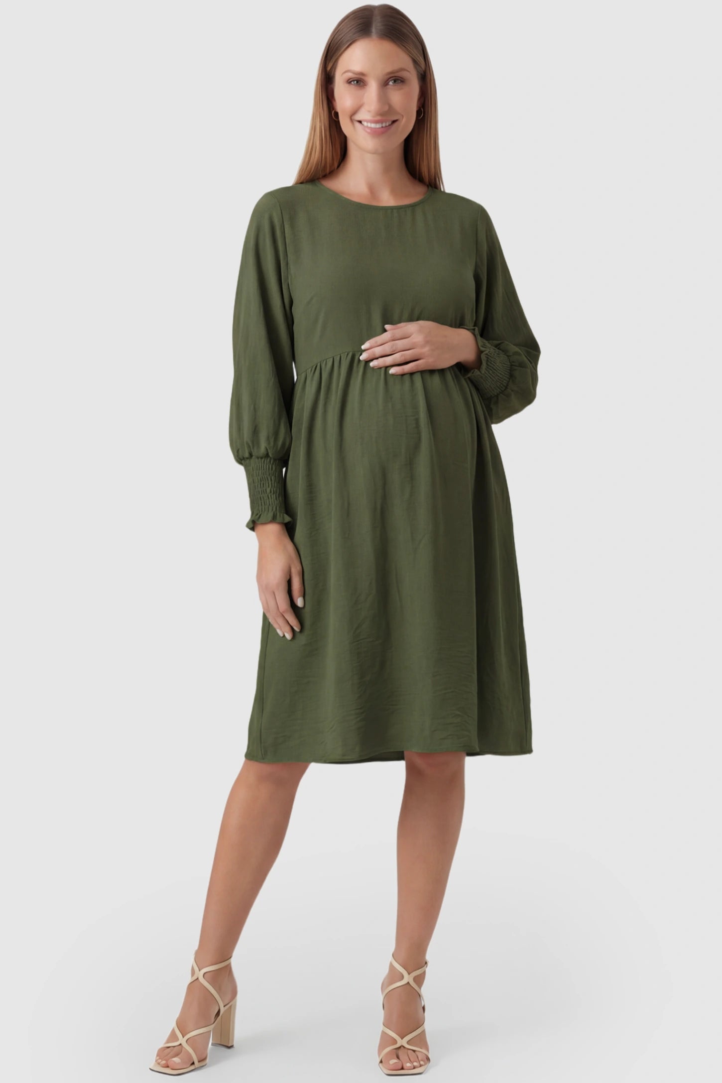 Balloon Sleeve Empire Waist Maternity Midi Dress in army green featuring smocked elastic cuff sleeves and soft drape on a pregnant model, front view.