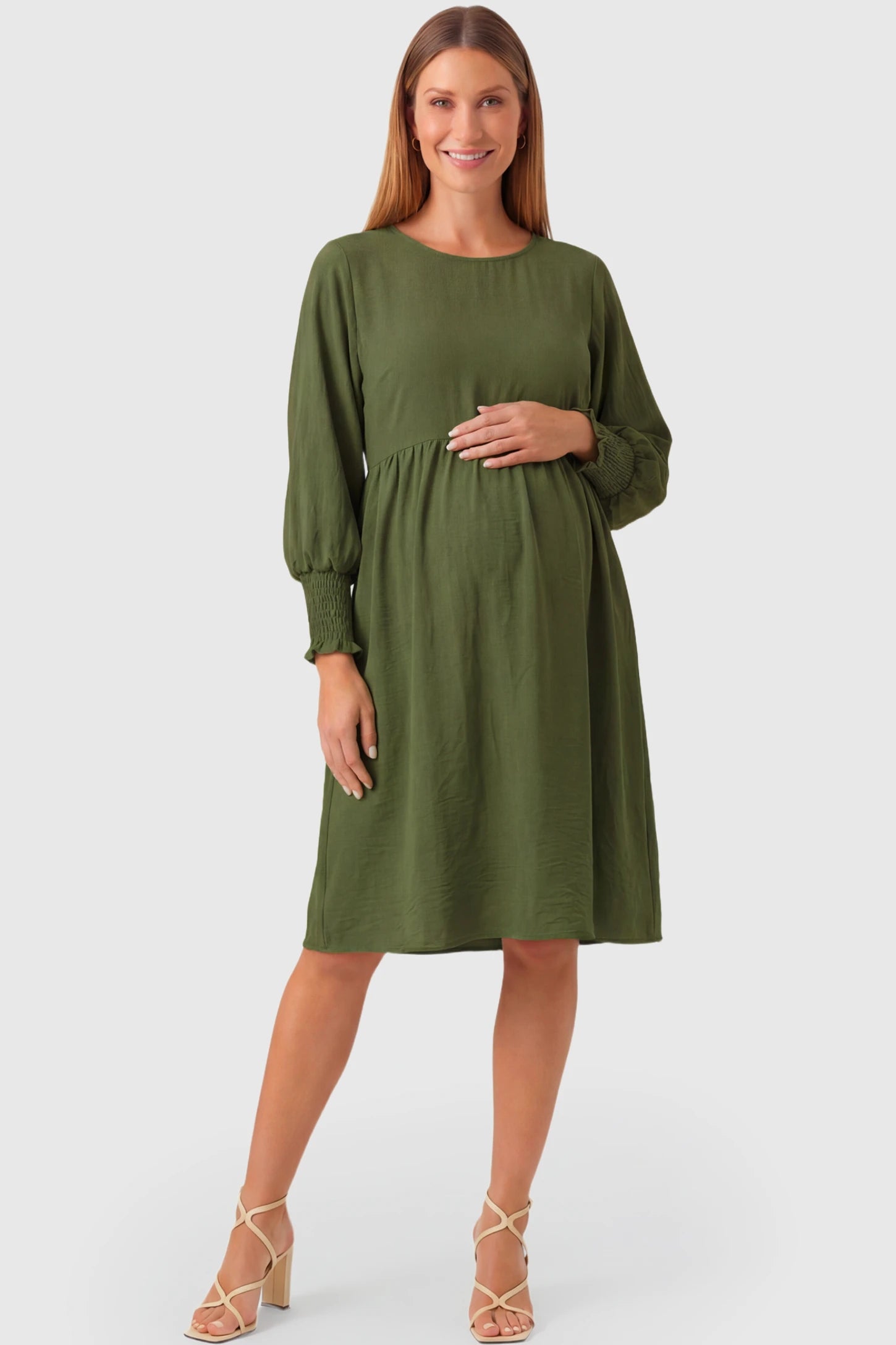 Balloon Sleeve Empire Waist Maternity Midi Dress Balloon Sleeve Empire Waist Maternity Midi Dress in army green featuring smocked elastic cuff sleeves and soft drape on a pregnant model.