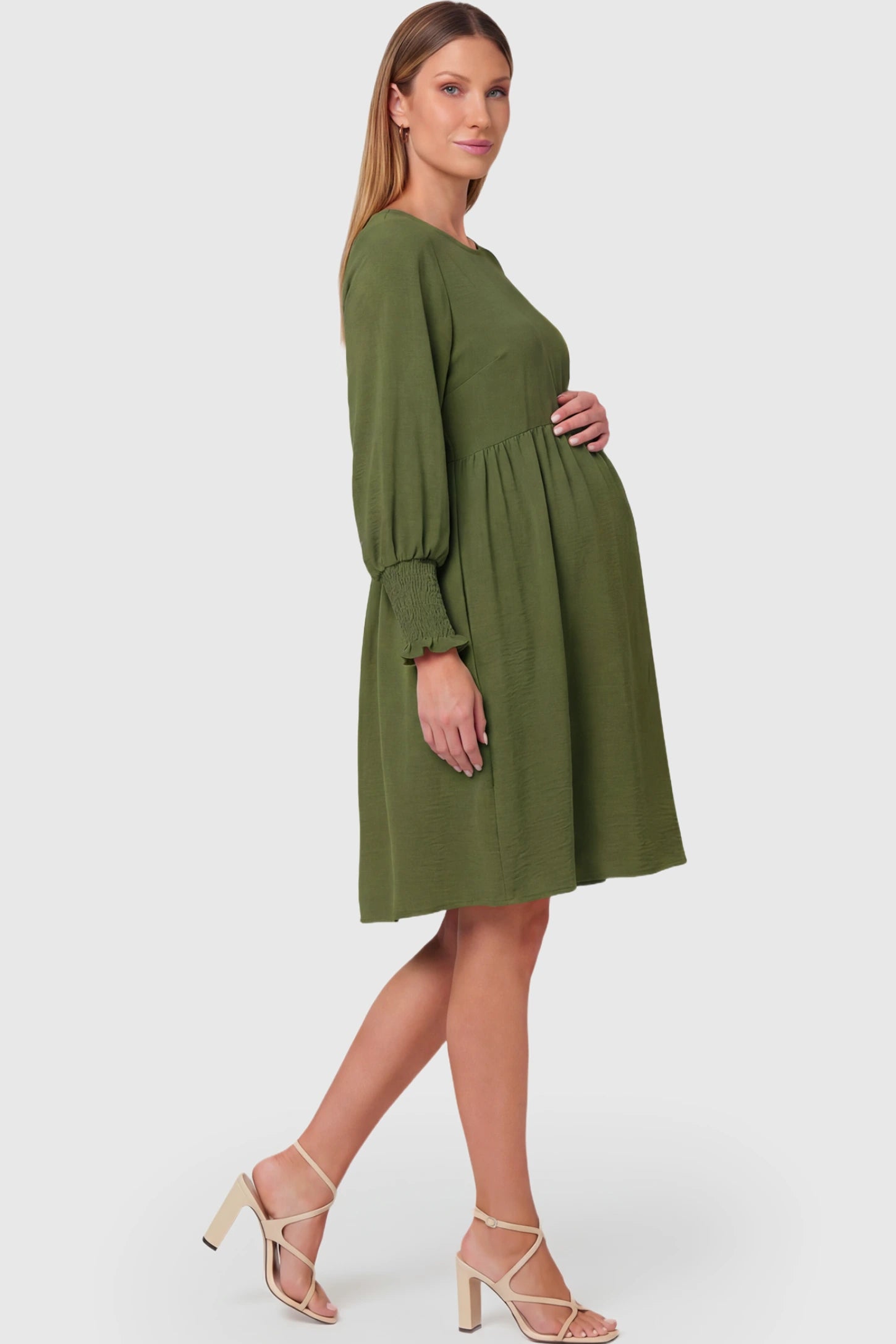 Balloon Sleeve Empire Waist Maternity Midi Dress Balloon Sleeve Empire Waist Maternity Midi Dress in army green featuring smocked elastic cuff sleeves and soft drape on a pregnant model.