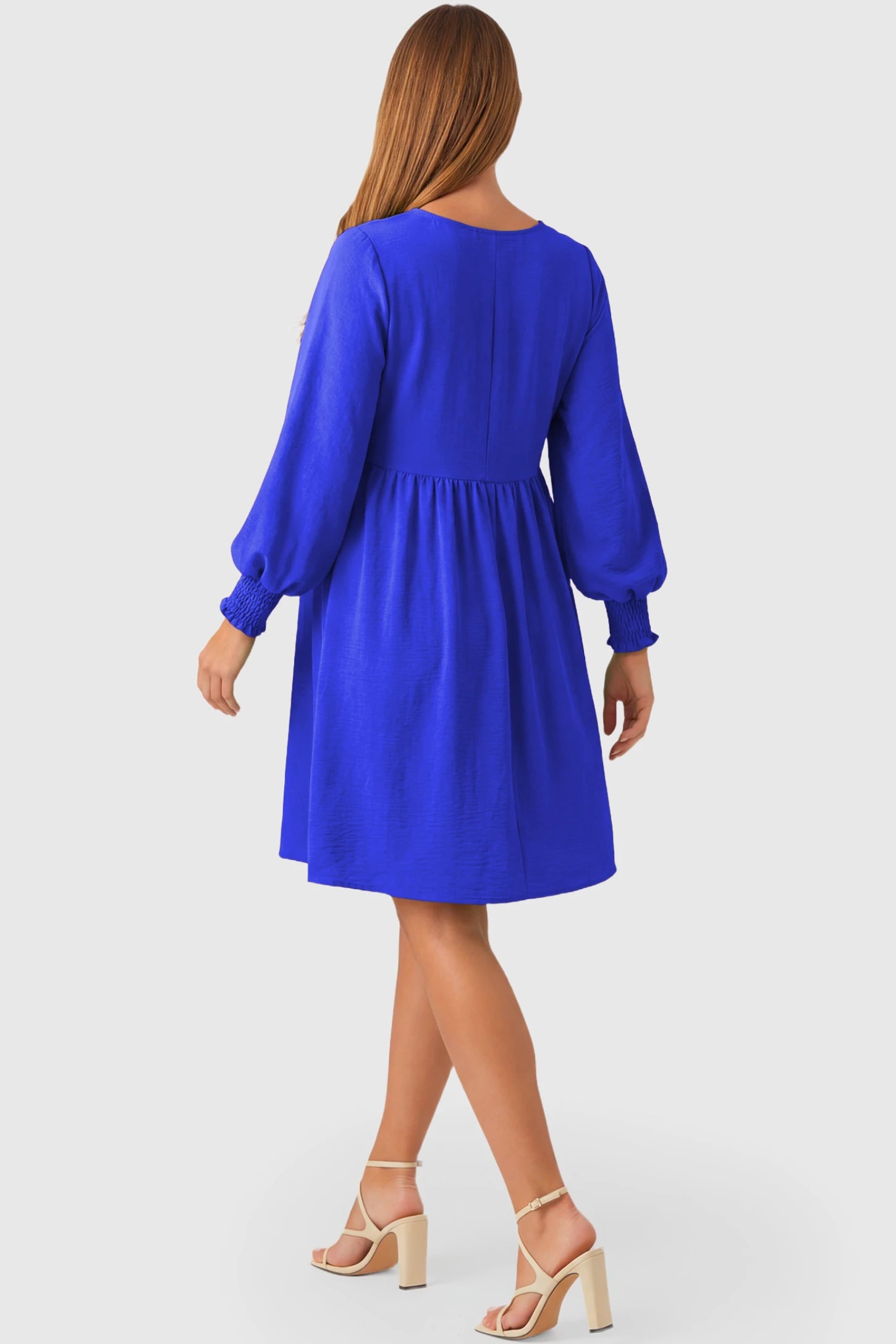 Balloon Sleeve Empire Waist Maternity Midi Dress Balloon Sleeve Empire Waist Maternity Midi Dress in blue featuring smocked elastic cuff sleeves and soft drape on a pregnant model.