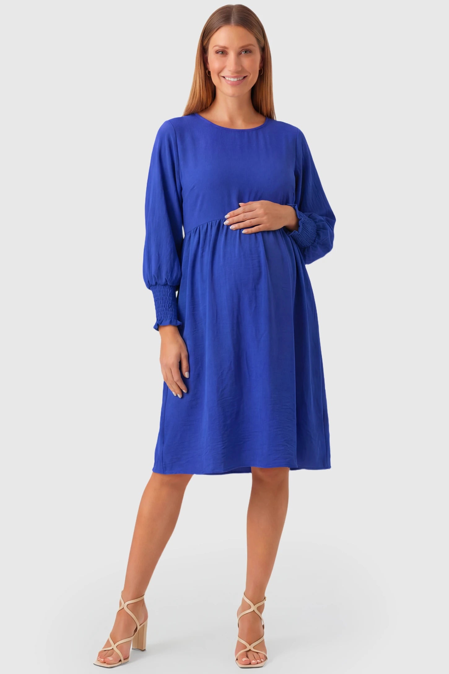 Balloon Sleeve Empire Waist Maternity Midi Dress Balloon Sleeve Empire Waist Maternity Midi Dress in blue featuring smocked elastic cuff sleeves and soft drape on a pregnant model.