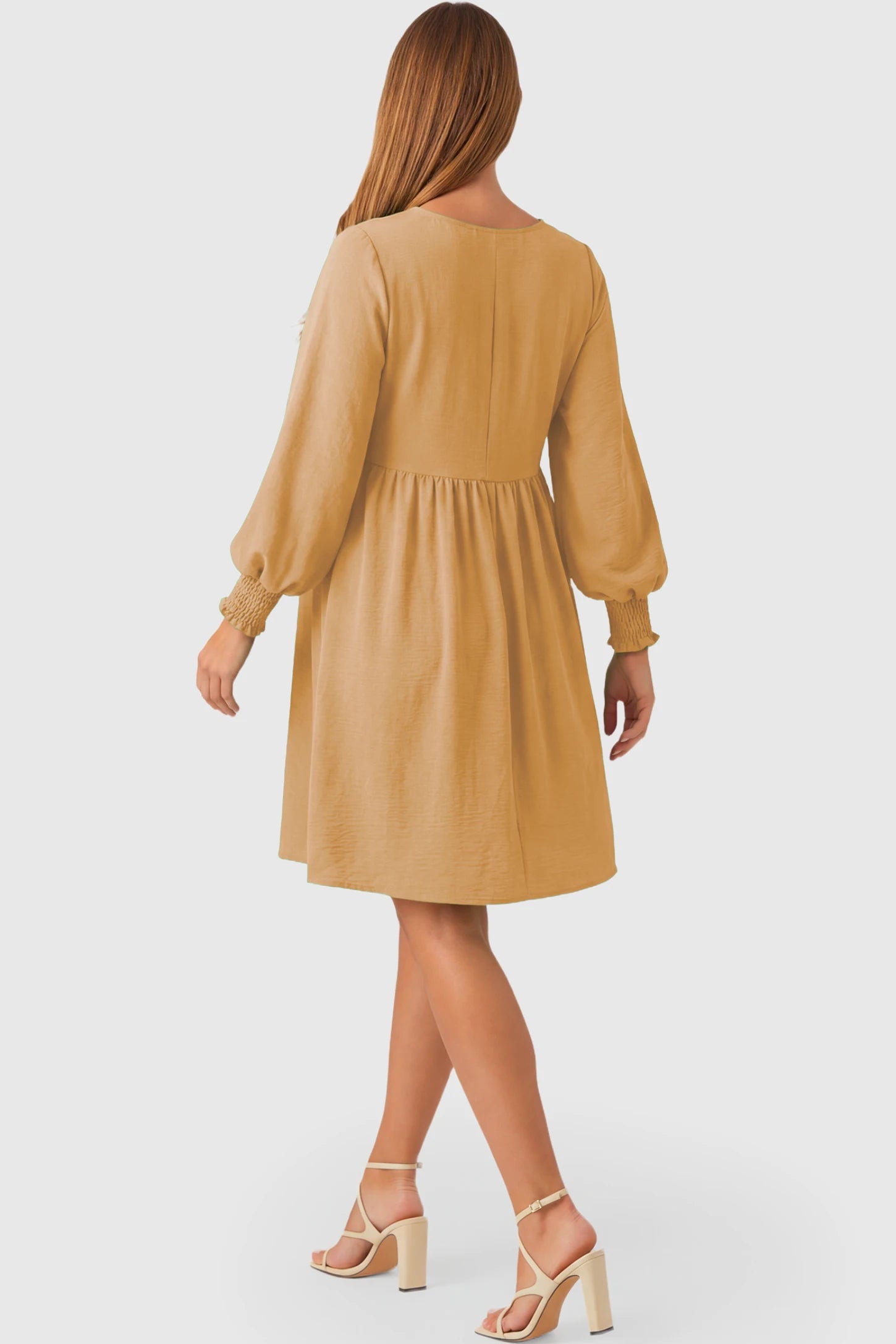 Balloon Sleeve Empire Waist Maternity Midi Dress Balloon Sleeve Empire Waist Maternity Midi Dress in khaki featuring smocked elastic cuff sleeves and soft drape on a pregnant model.