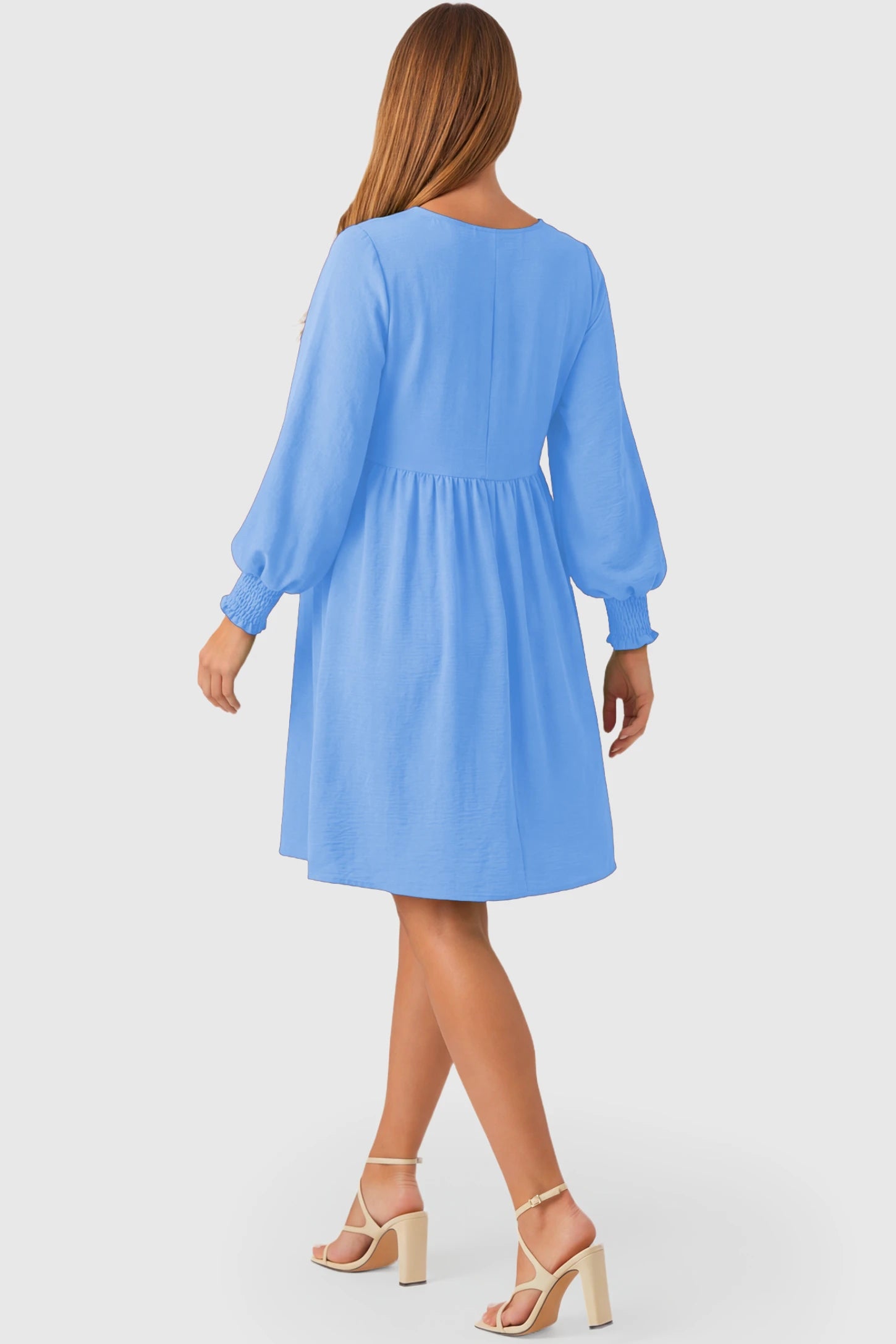 Balloon Sleeve Empire Waist Maternity Midi Dress Balloon Sleeve Empire Waist Maternity Midi Dress in light blue featuring smocked elastic cuff sleeves and soft drape on a pregnant model.